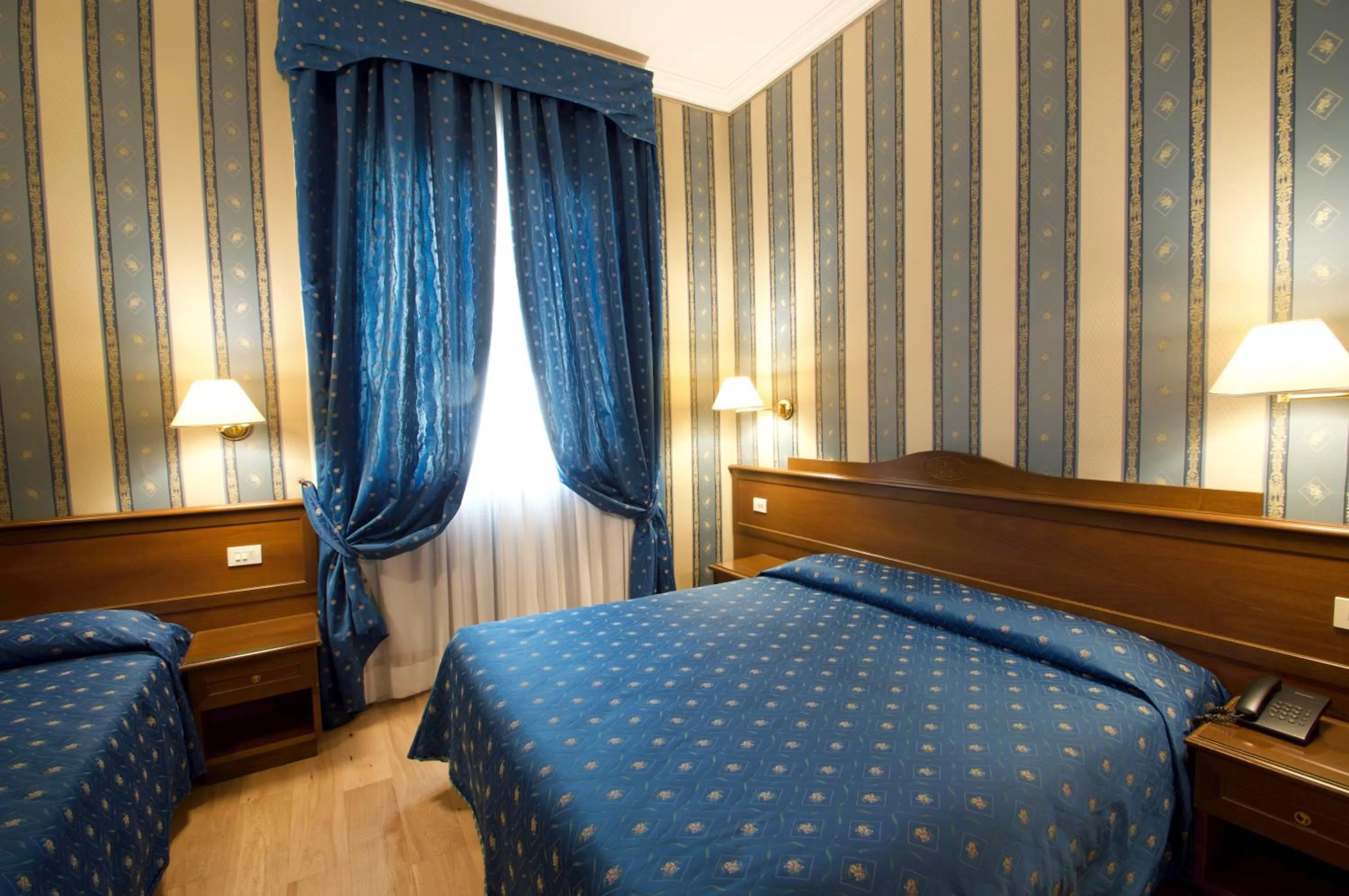 Bed in Hotel Montecarlo