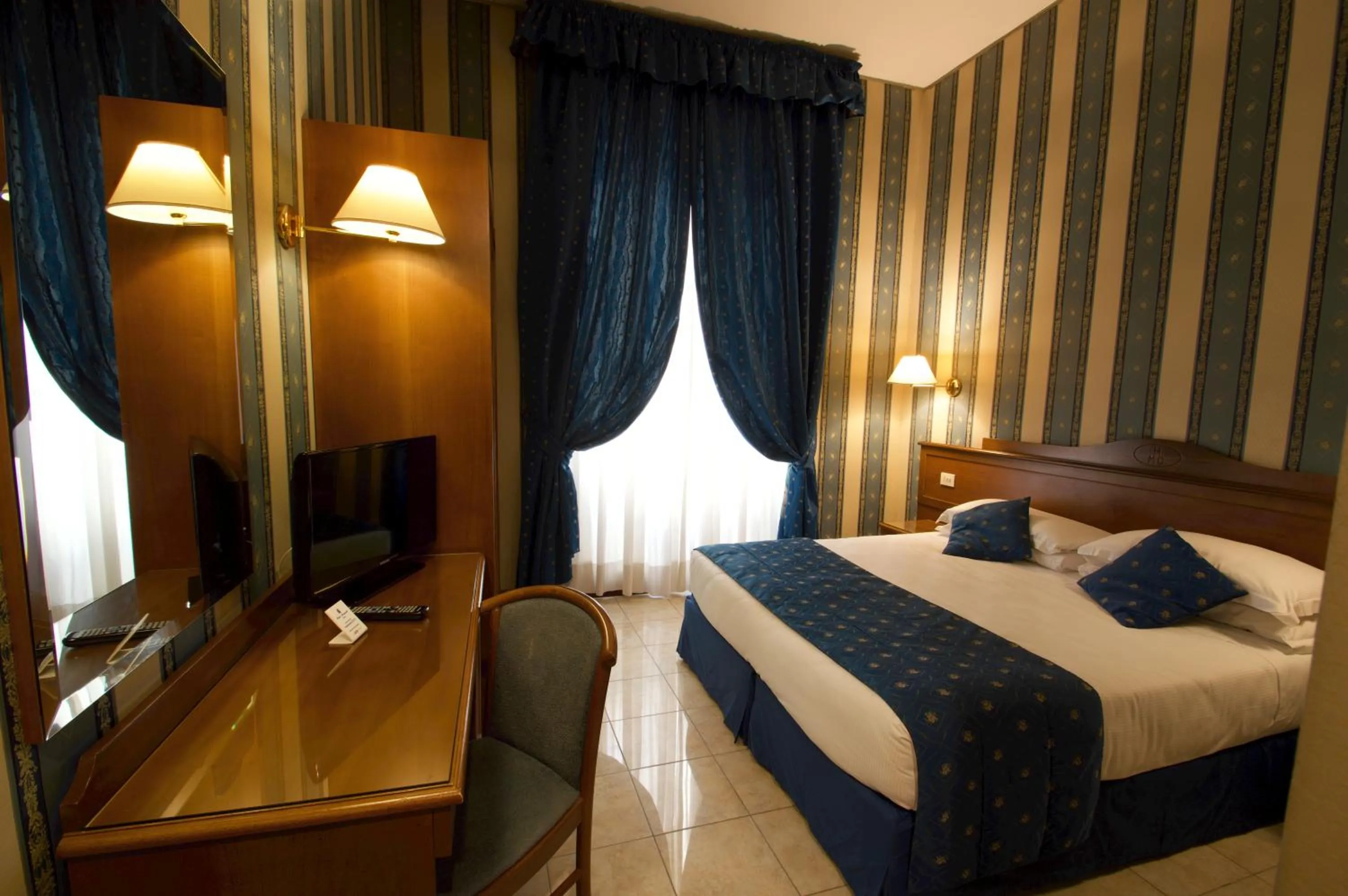 Bed in Hotel Montecarlo