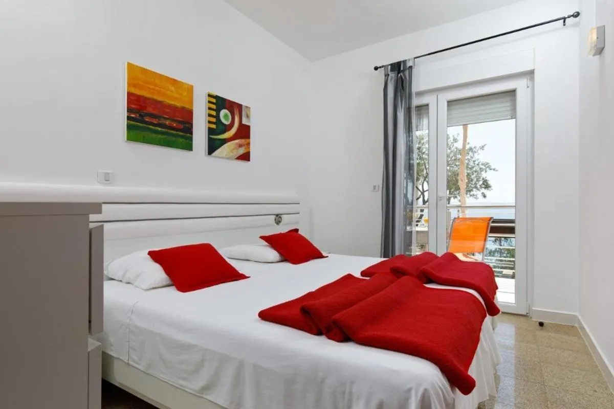 Bedroom, Bed in Fully equiped Beach Apartments with its own balcony