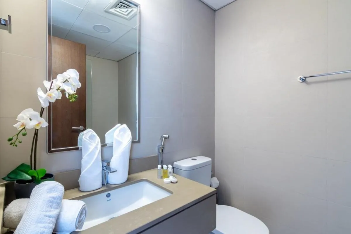 Bathroom in Silkhaus comfy DIFC studio with Burj Khalifa view