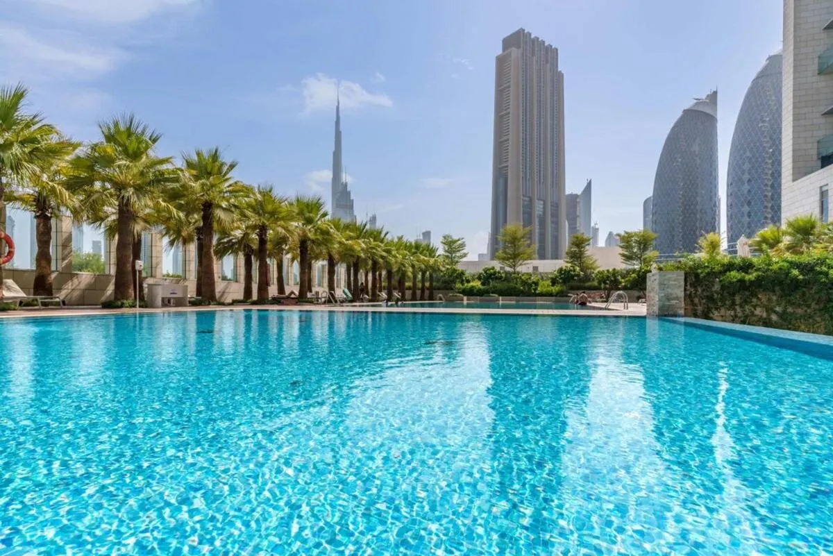 Swimming pool in Silkhaus comfy DIFC studio with Burj Khalifa view