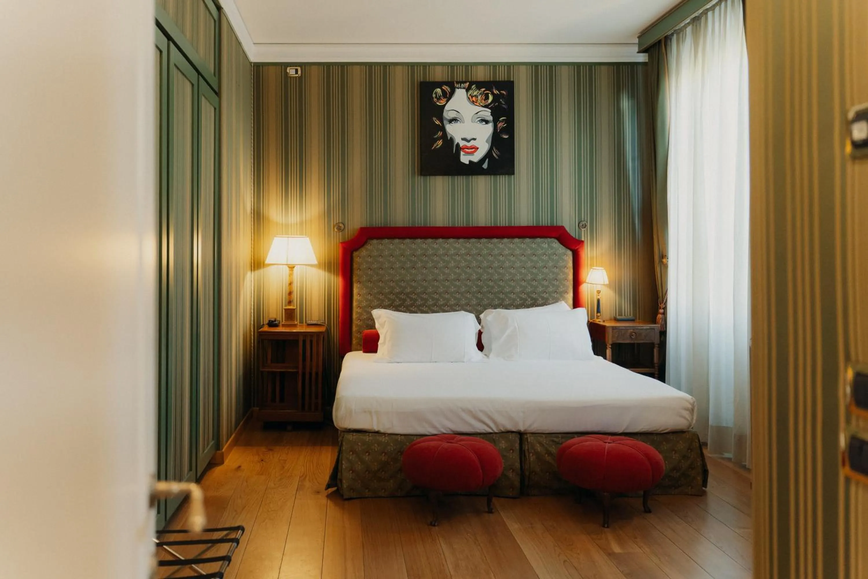 Bed in Hotel Palazzo Guiscardo Pietrasanta