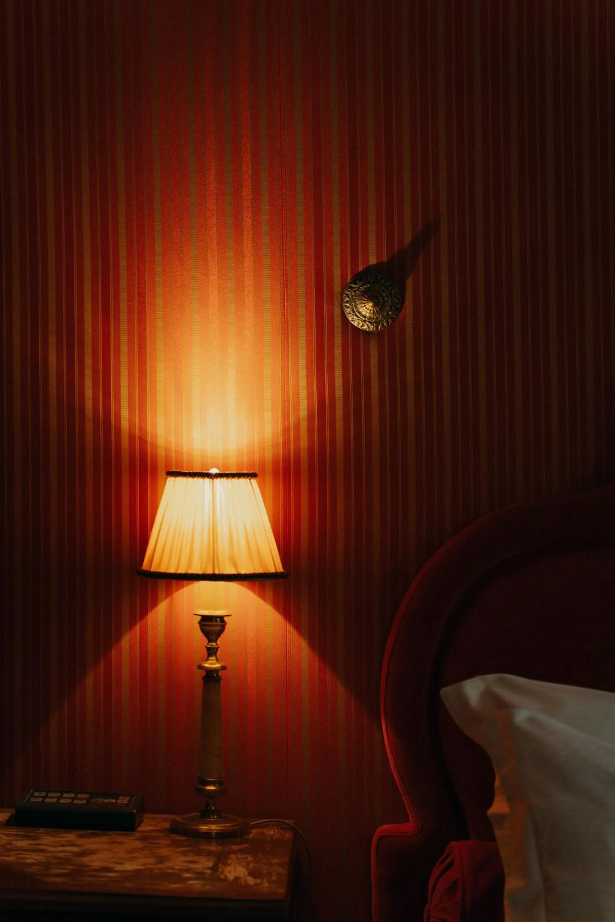 Decorative detail, Bed in Hotel Palazzo Guiscardo Pietrasanta