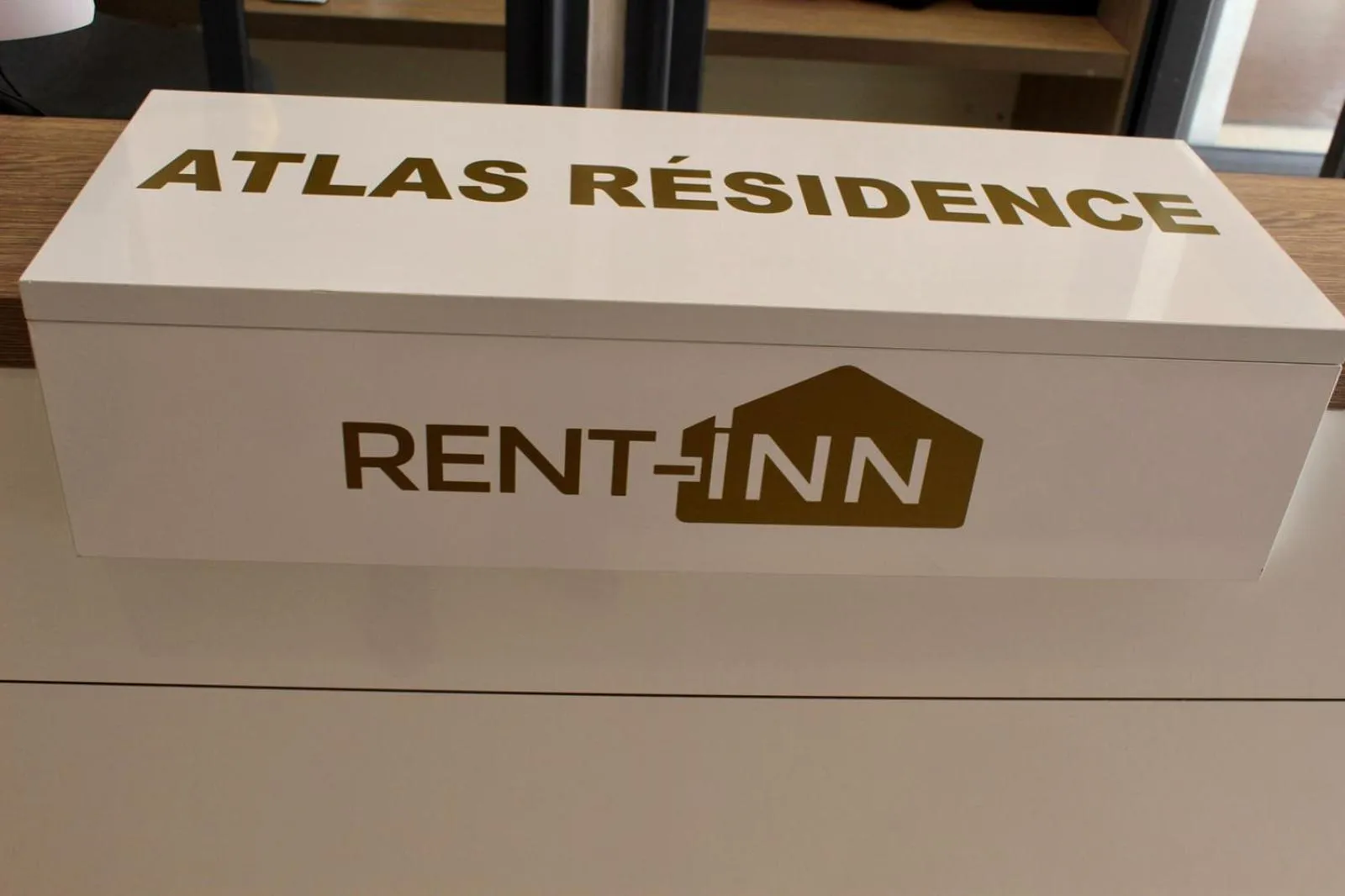 Property logo or sign in Atlas-Résidence by Rent-Inn