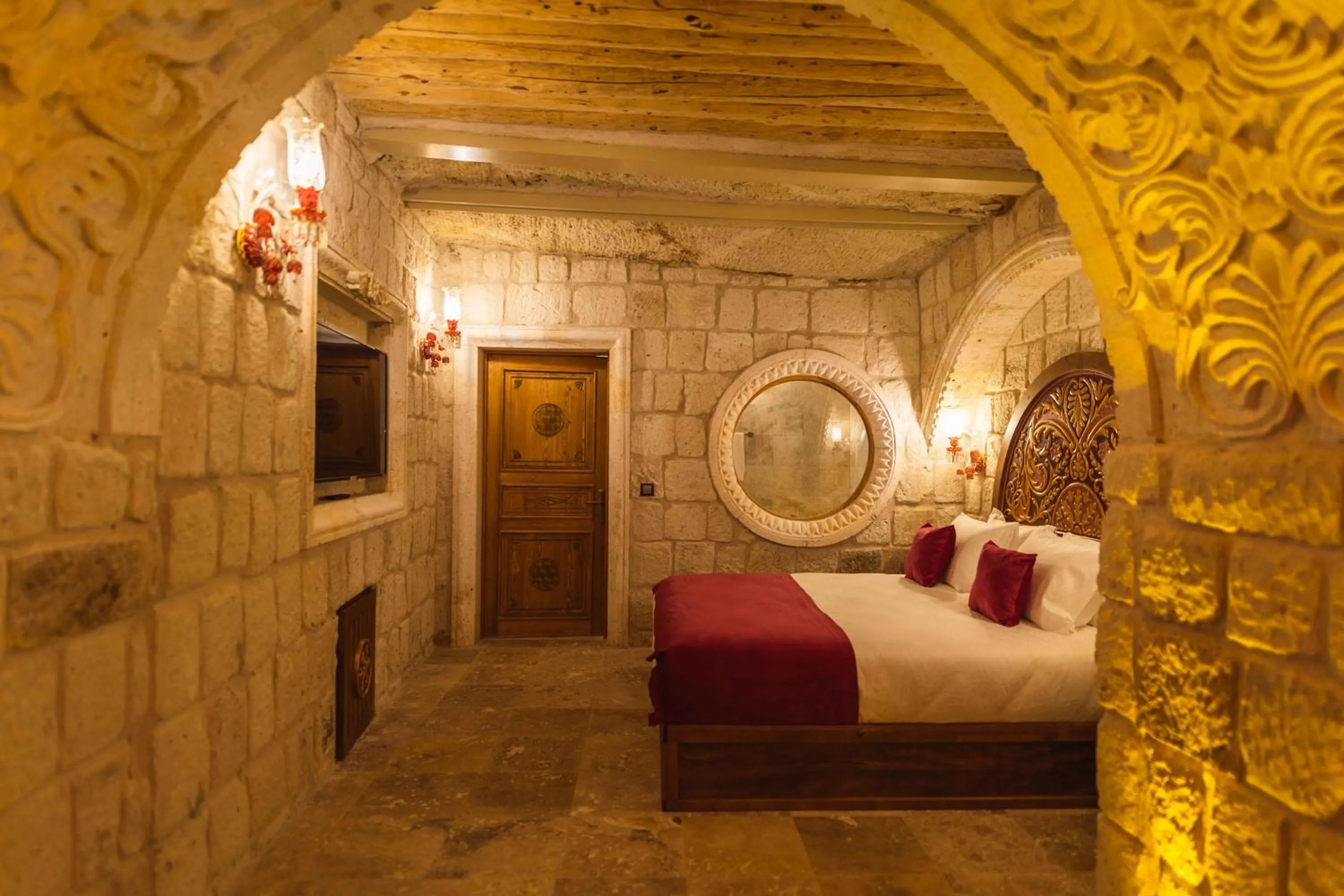 Bed in Solo Cave Suites