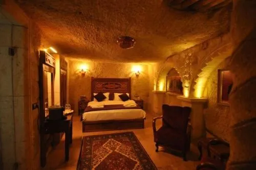 Bed in Solo Cave Suites