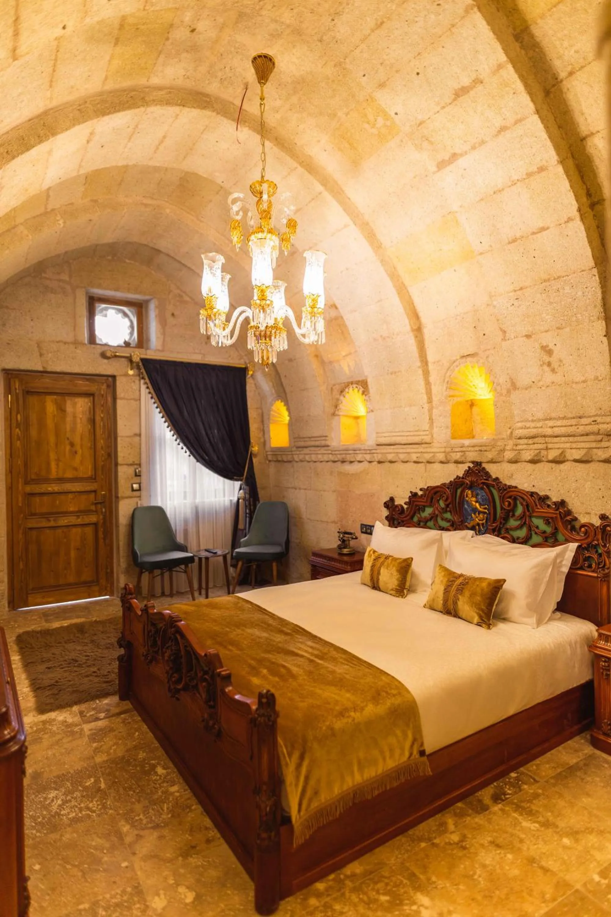 Bed in Solo Cave Suites