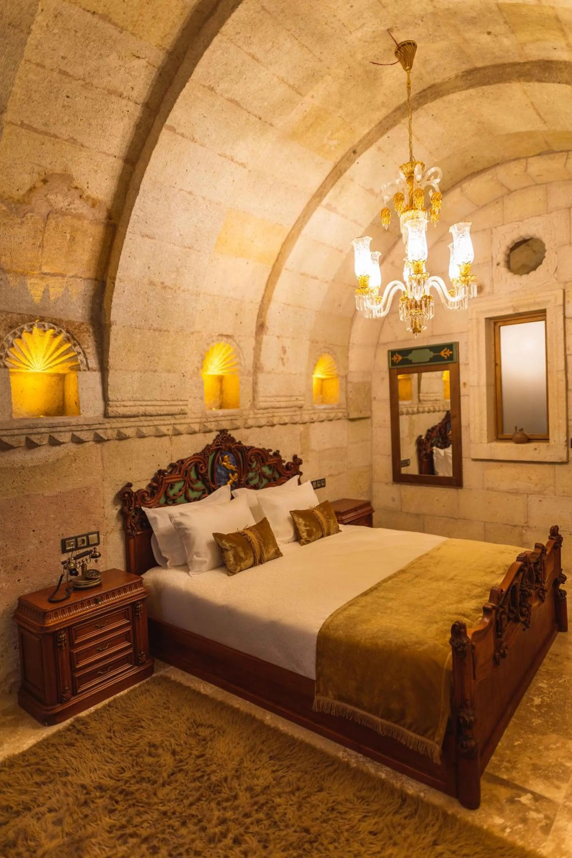 Bed in Solo Cave Suites