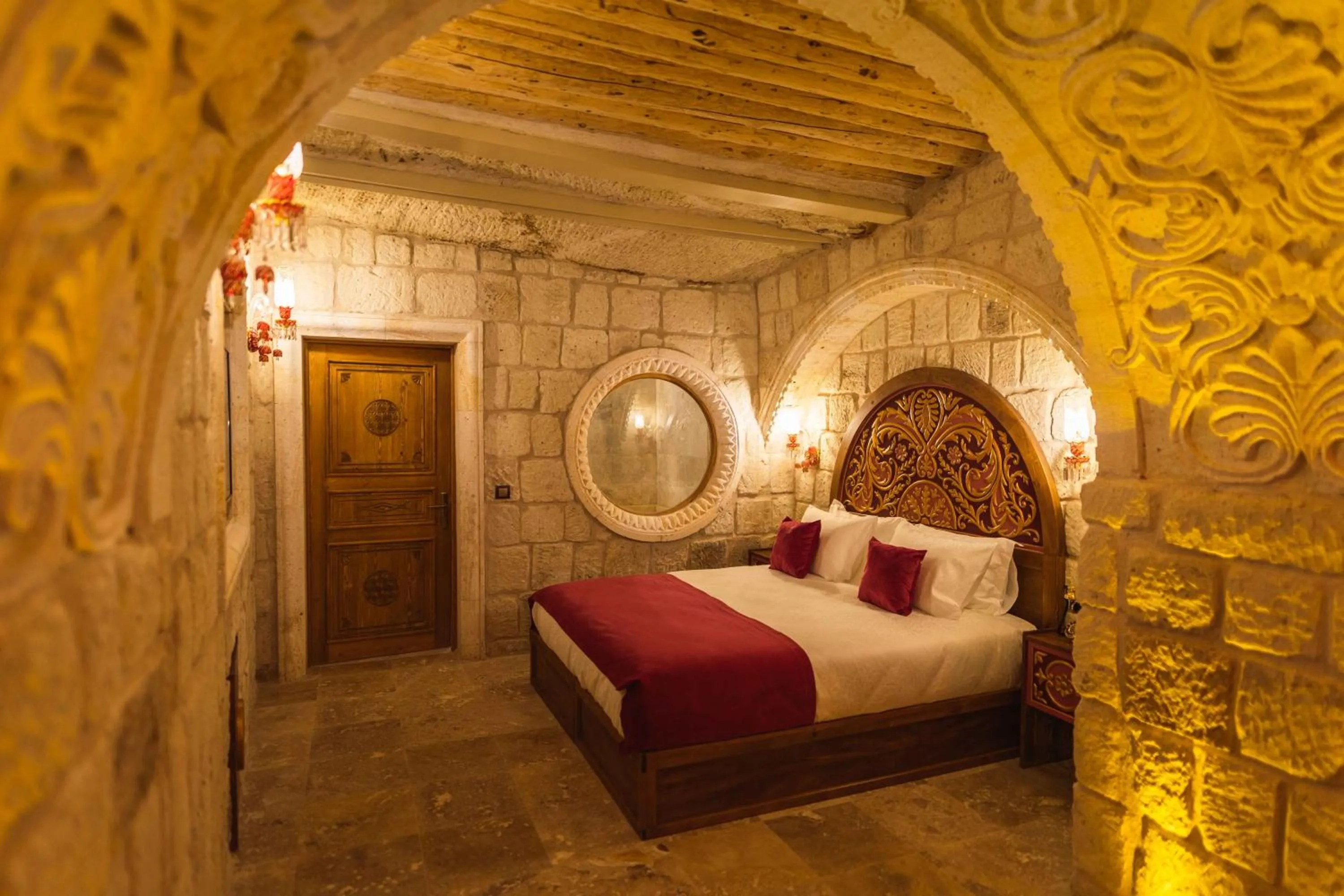 Bed in Solo Cave Suites