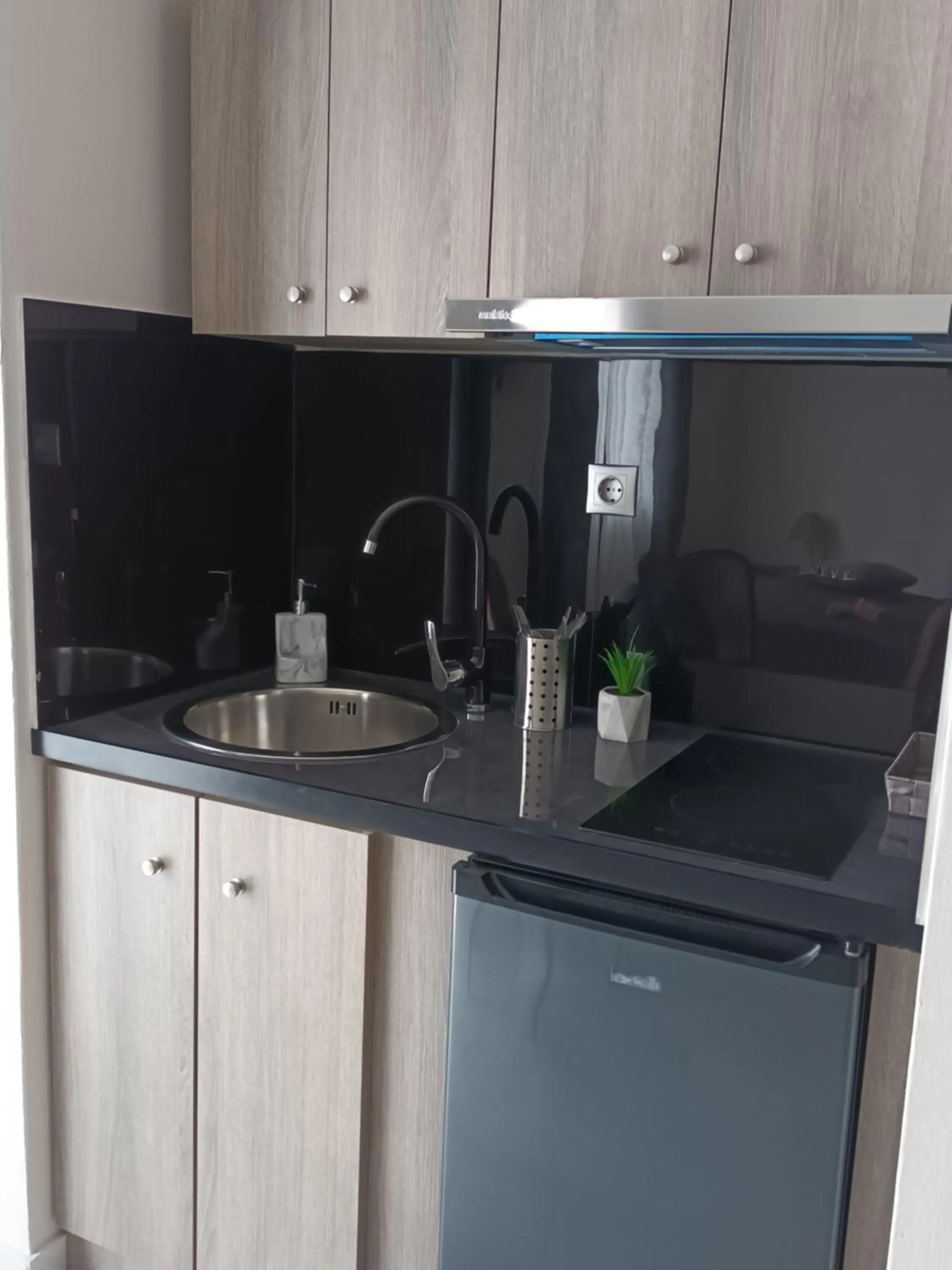 Kitchen or kitchenette in Secret Garden Hotel