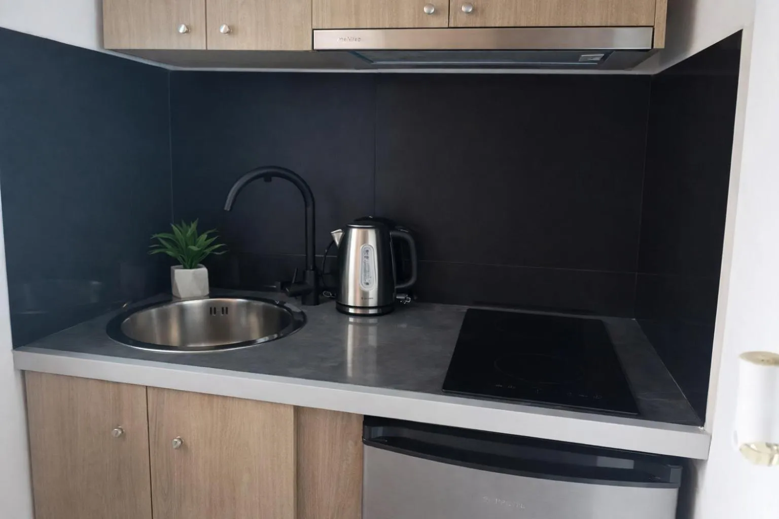 Kitchen or kitchenette in Secret Garden Hotel