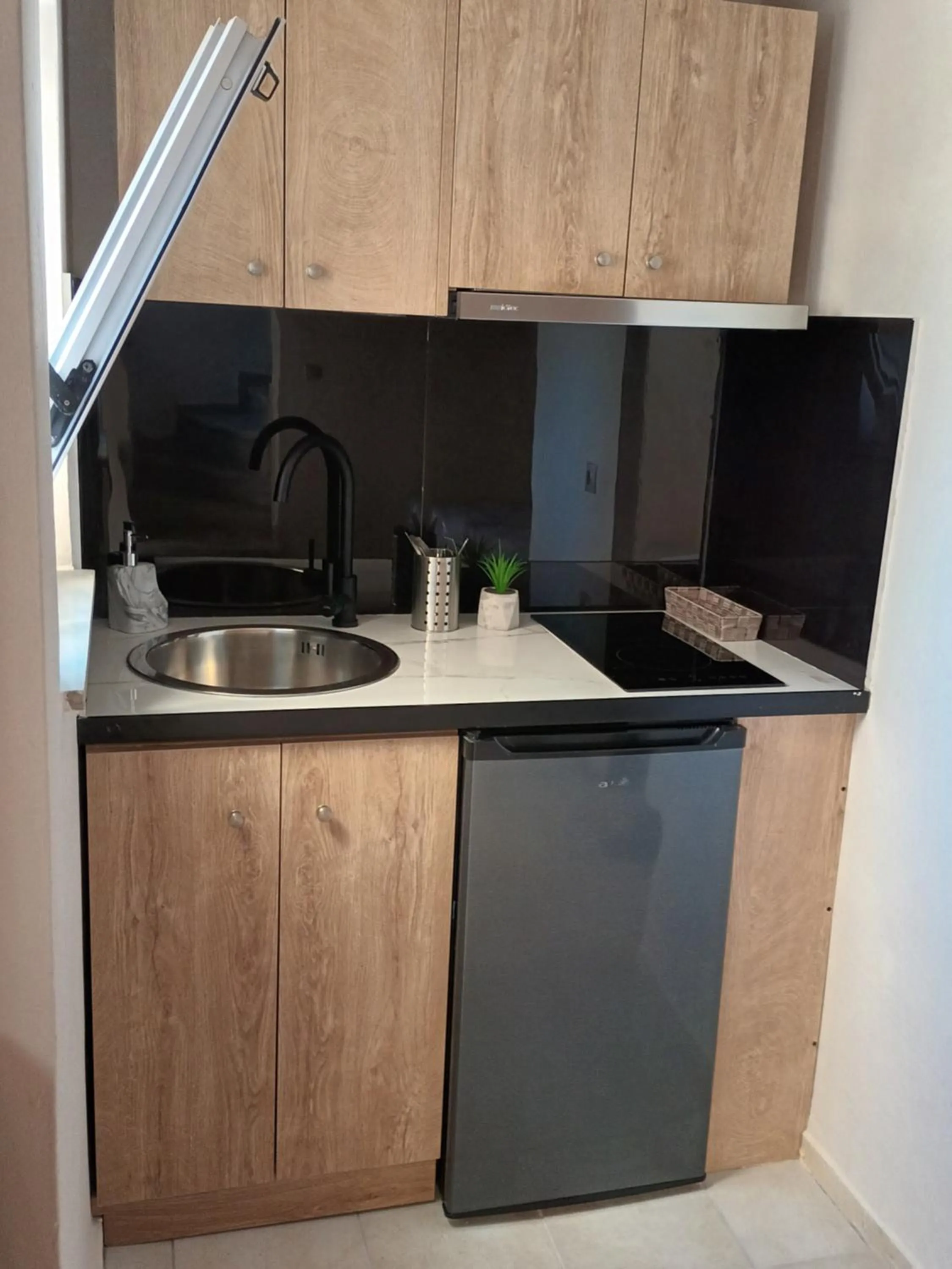 Kitchen or kitchenette in Secret Garden Hotel