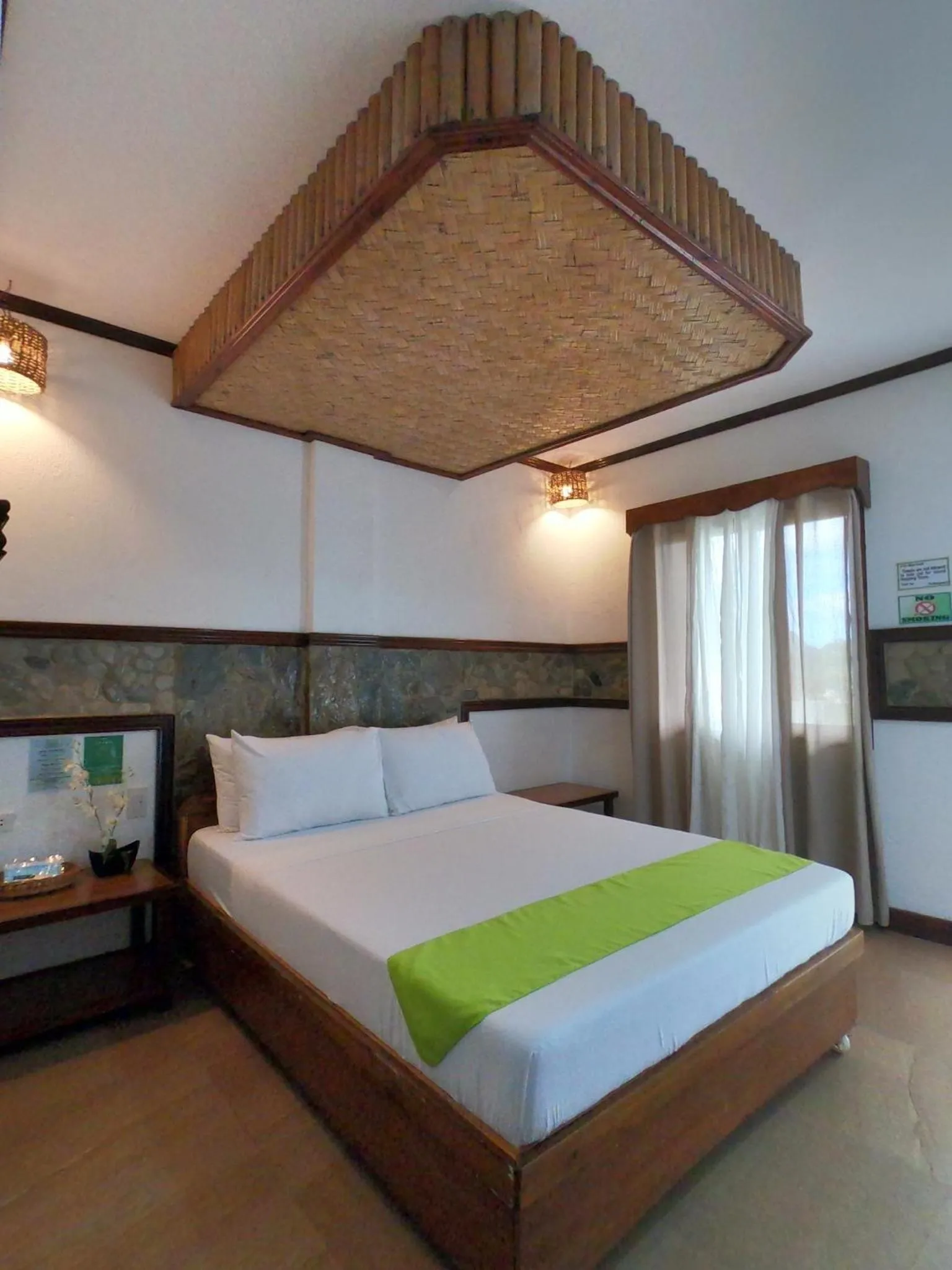 Bed in El Nido Viewdeck Cottages