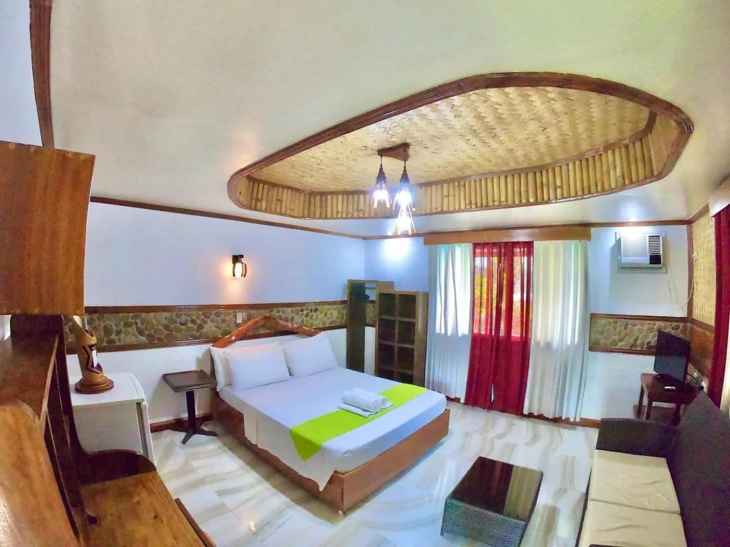 Bed in El Nido Viewdeck Cottages