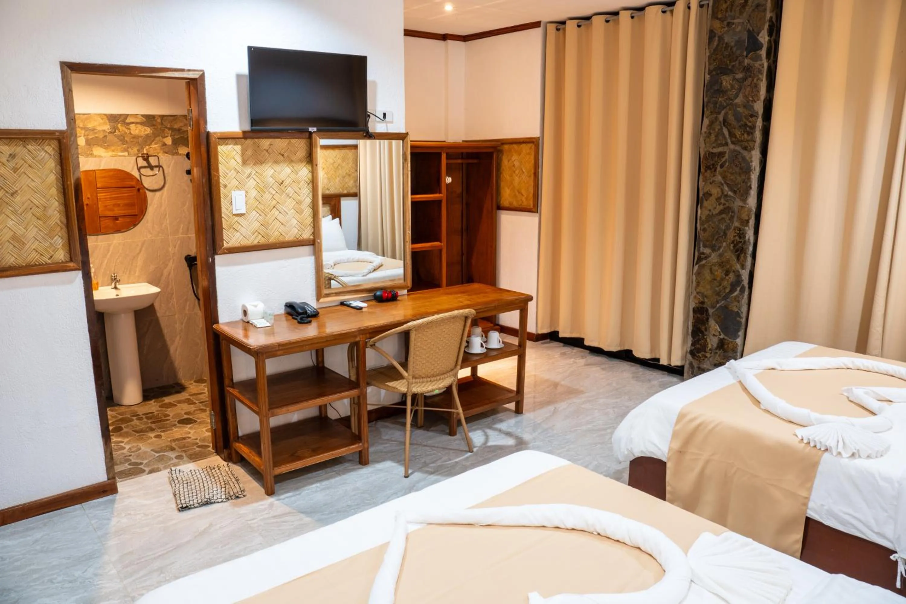 TV and multimedia, Bed in El Nido Viewdeck Cottages