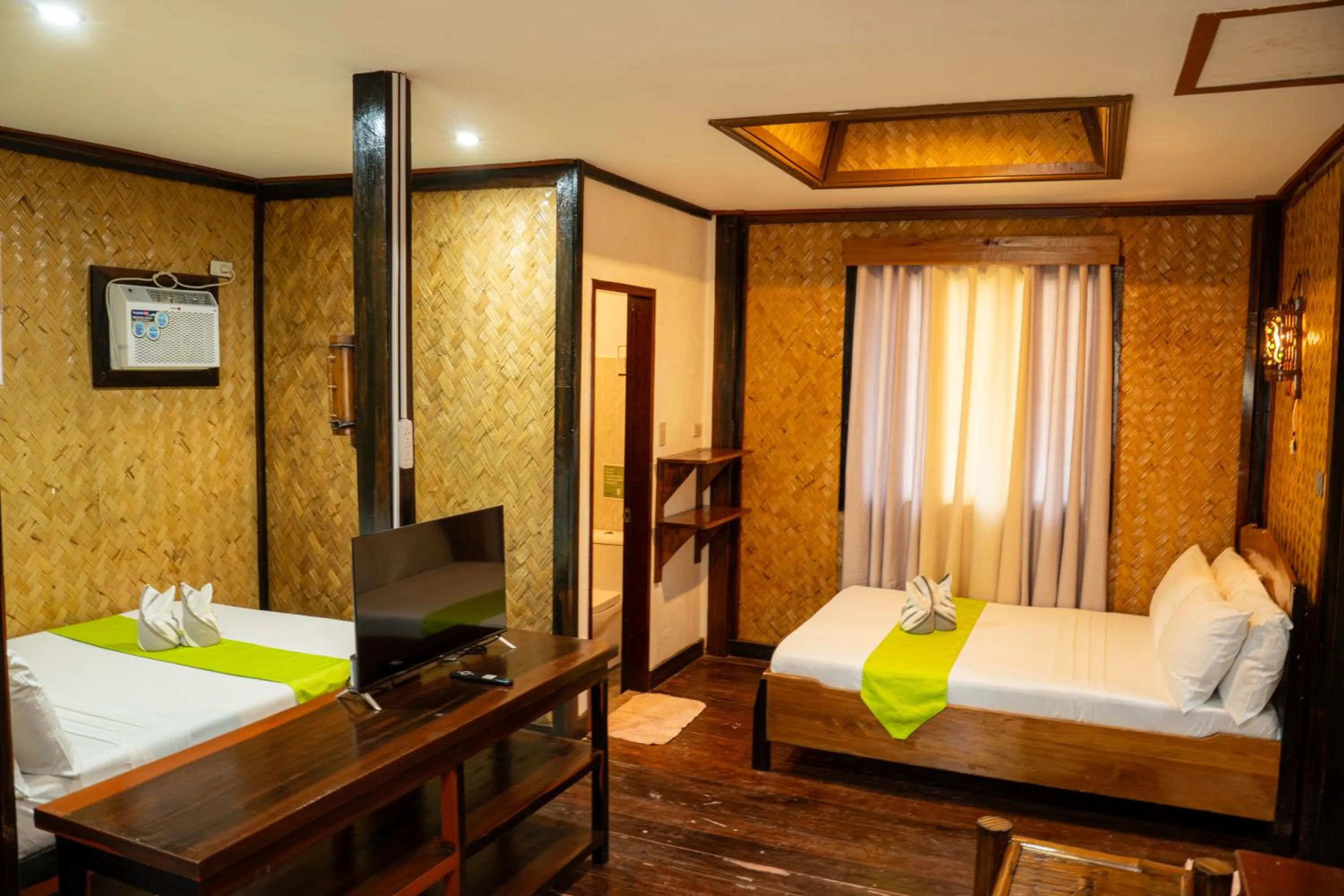 Bed in El Nido Viewdeck Cottages