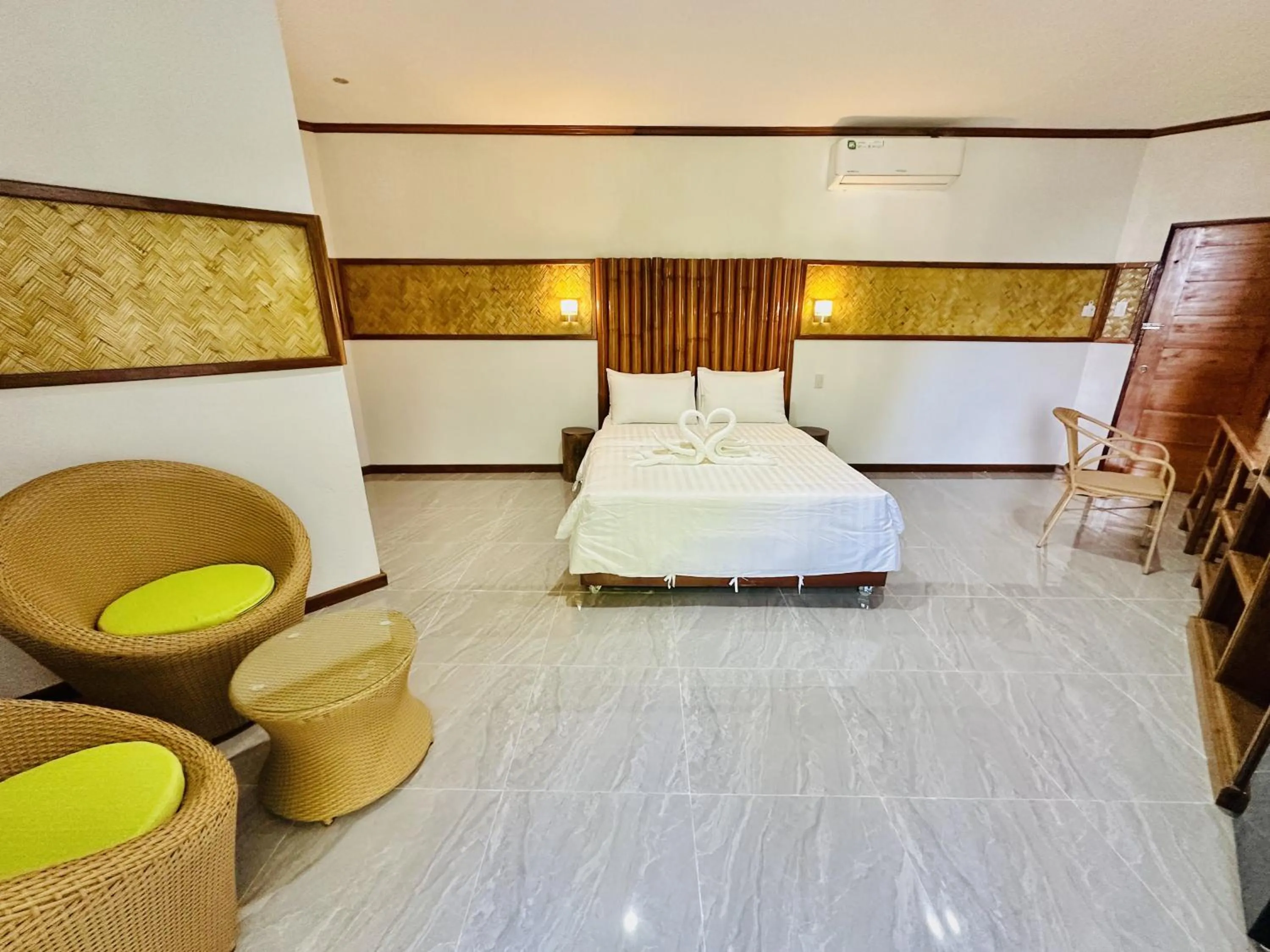 Bed in El Nido Viewdeck Cottages