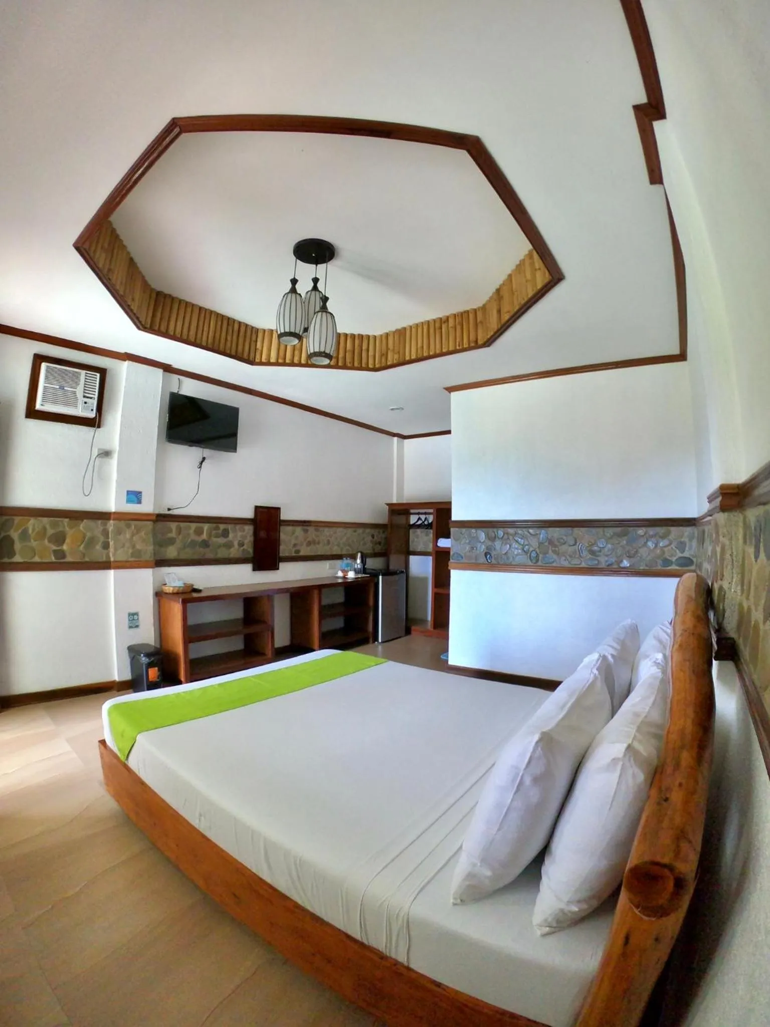 Bed in El Nido Viewdeck Cottages