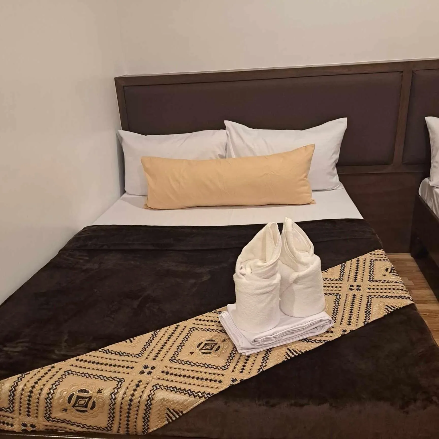 Bed in Jurias Garden Hotel