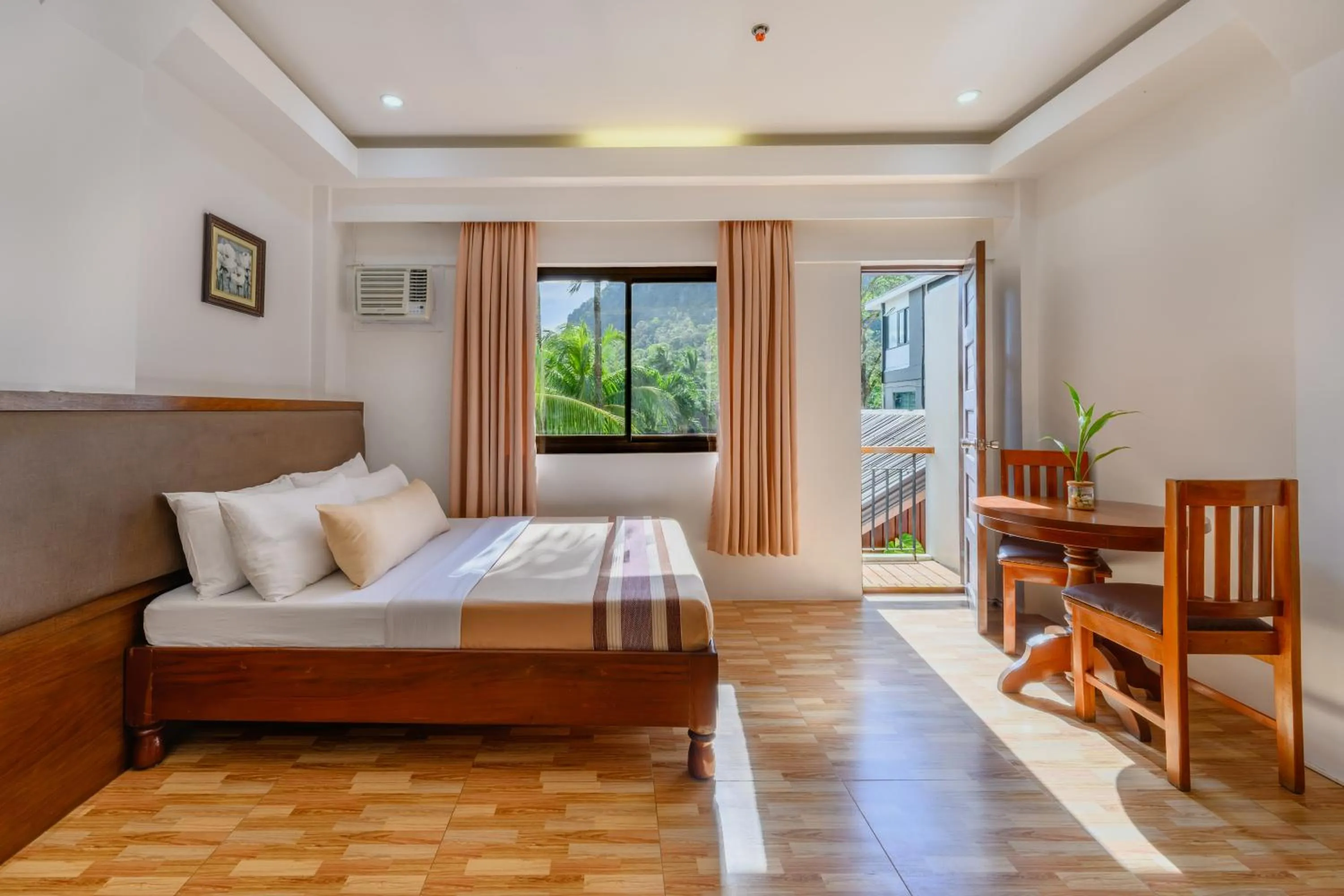 Bed in Jurias Garden Hotel