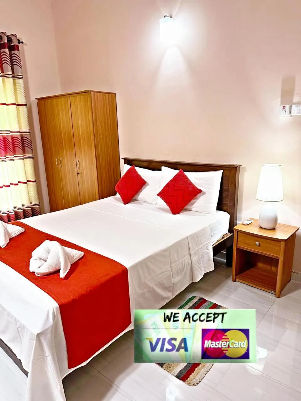 Bed in Lahiru Airport Villa