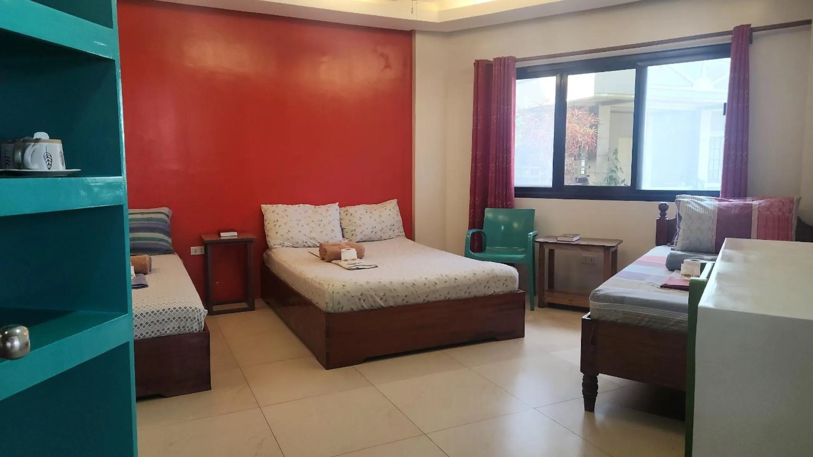 Bed in Inngo Tourist Inn