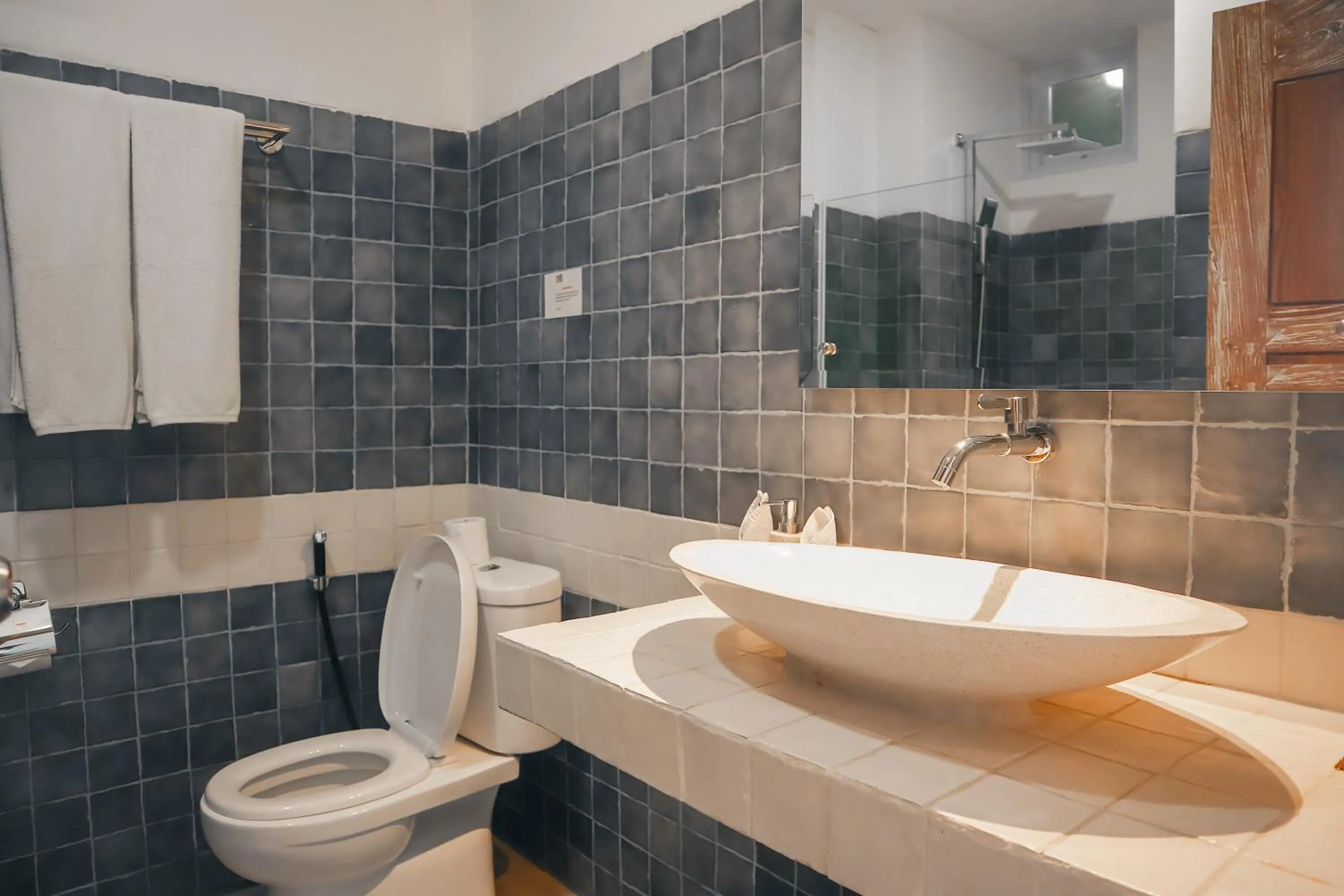 Toilet in Harbour Komodo Hotel