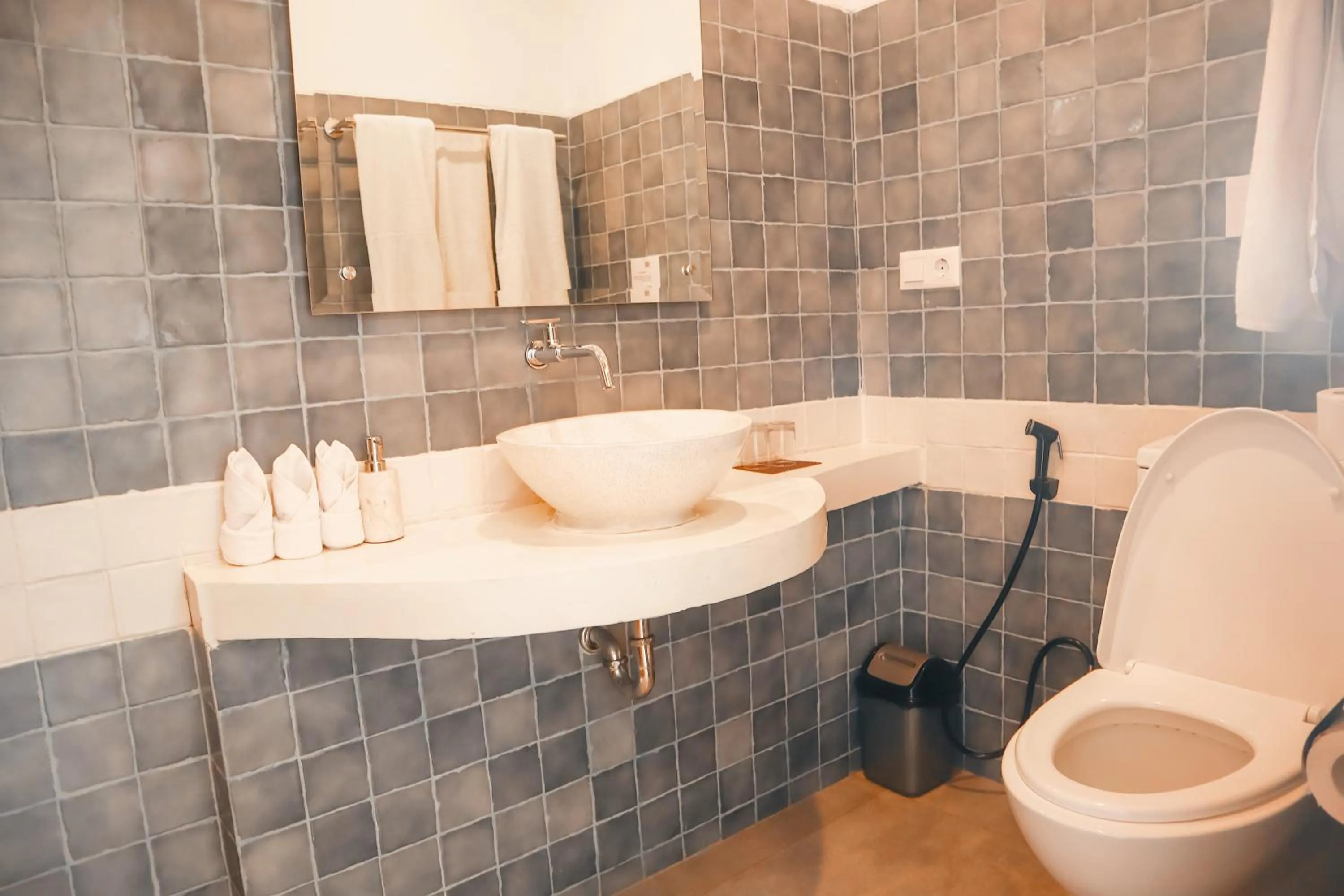 Toilet in Harbour Komodo Hotel