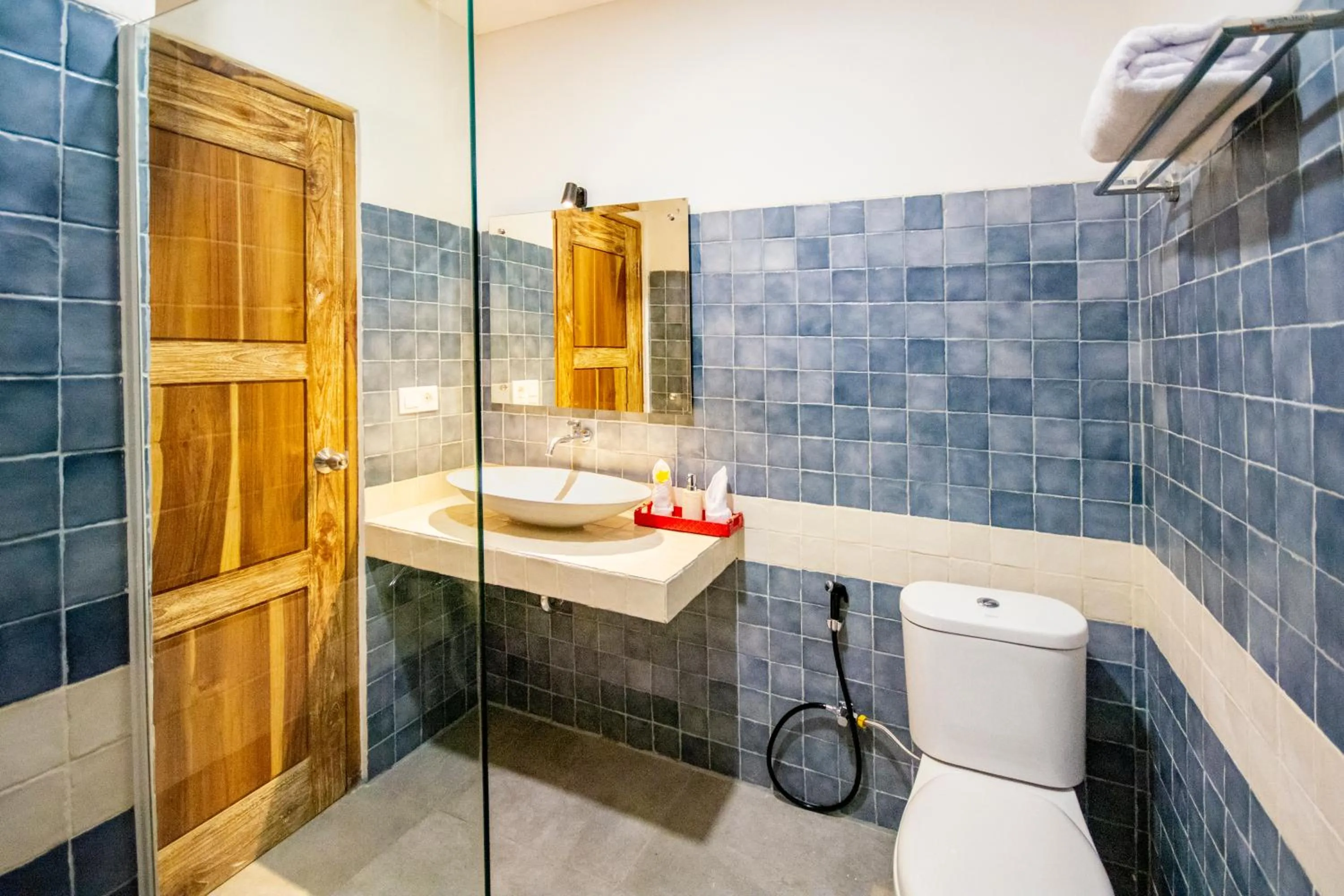 Bathroom in Harbour Komodo Hotel