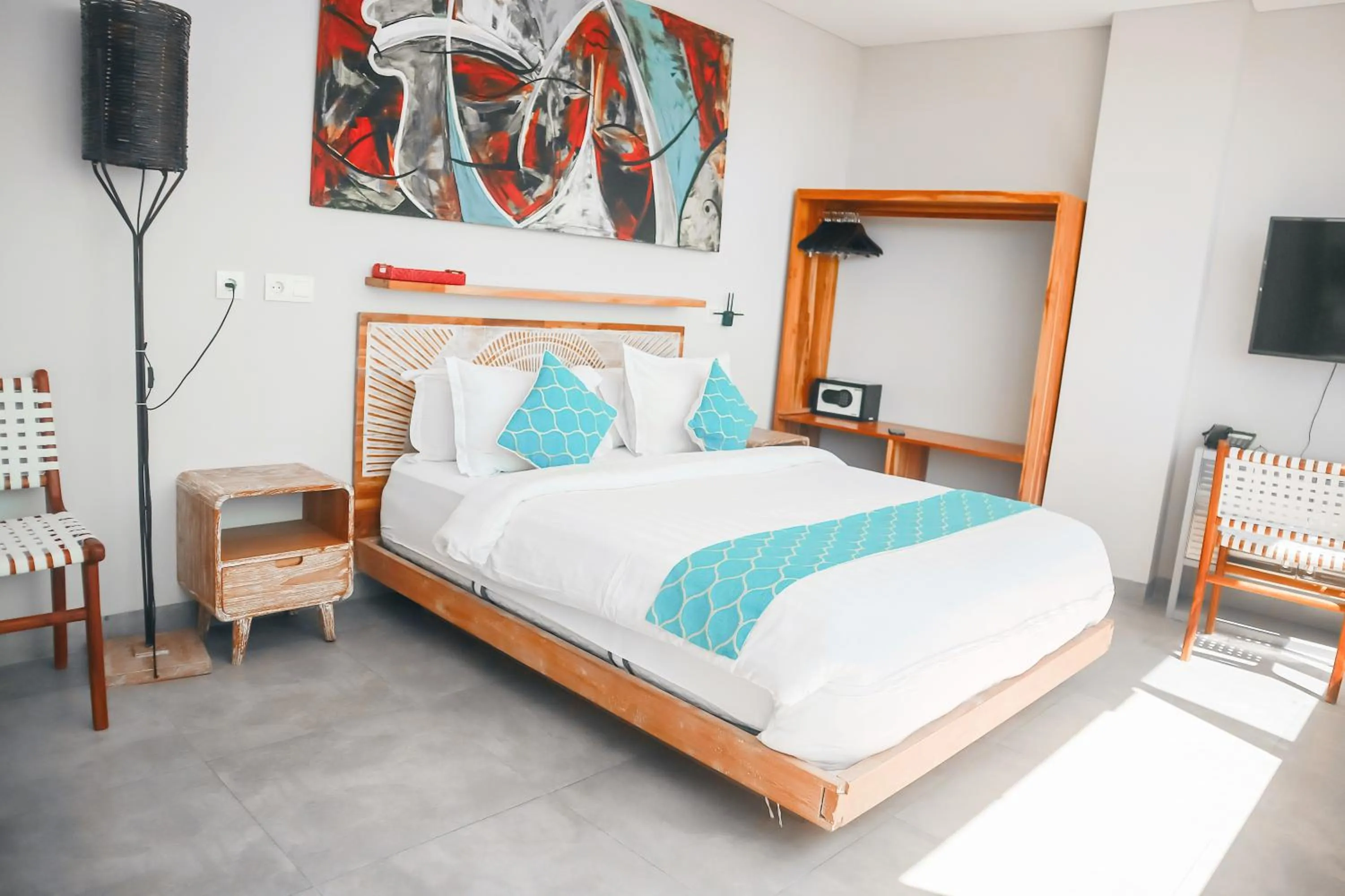 Communal lounge/ TV room, Bed in Harbour Komodo Hotel