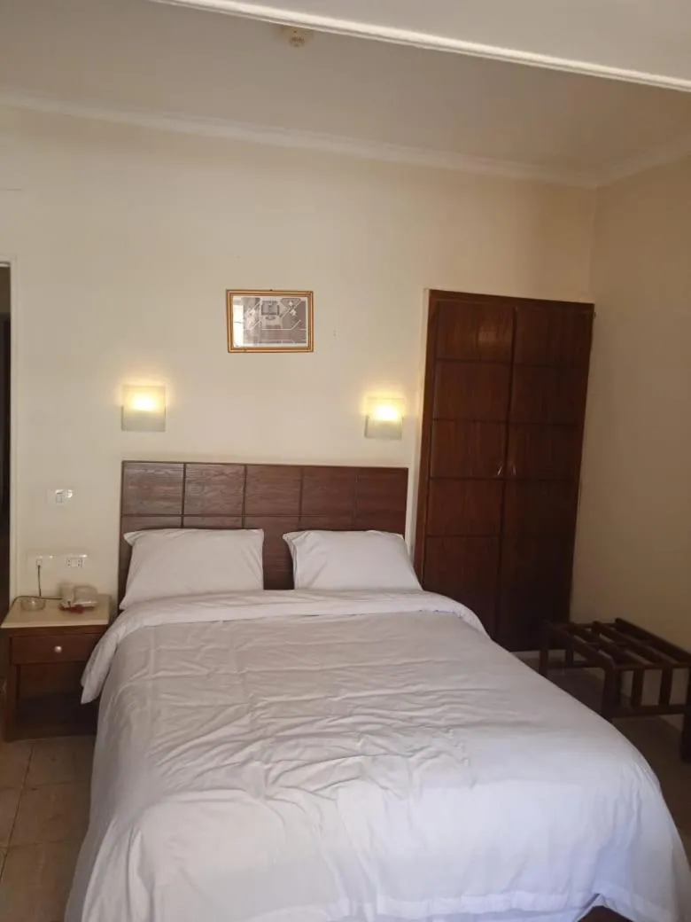 Bed in Regency Hotel