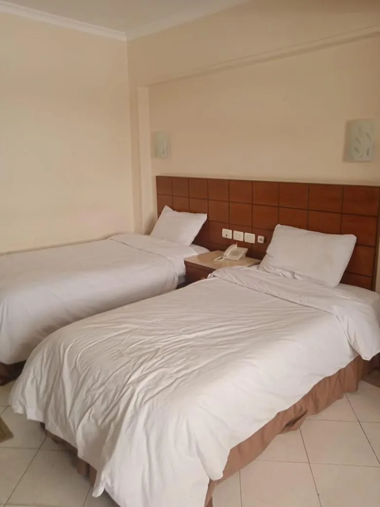 Bed in Regency Hotel