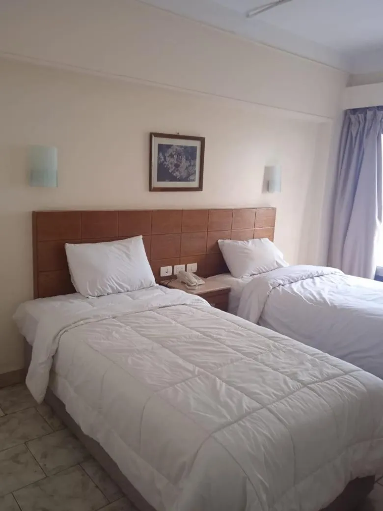 Bed in Regency Hotel