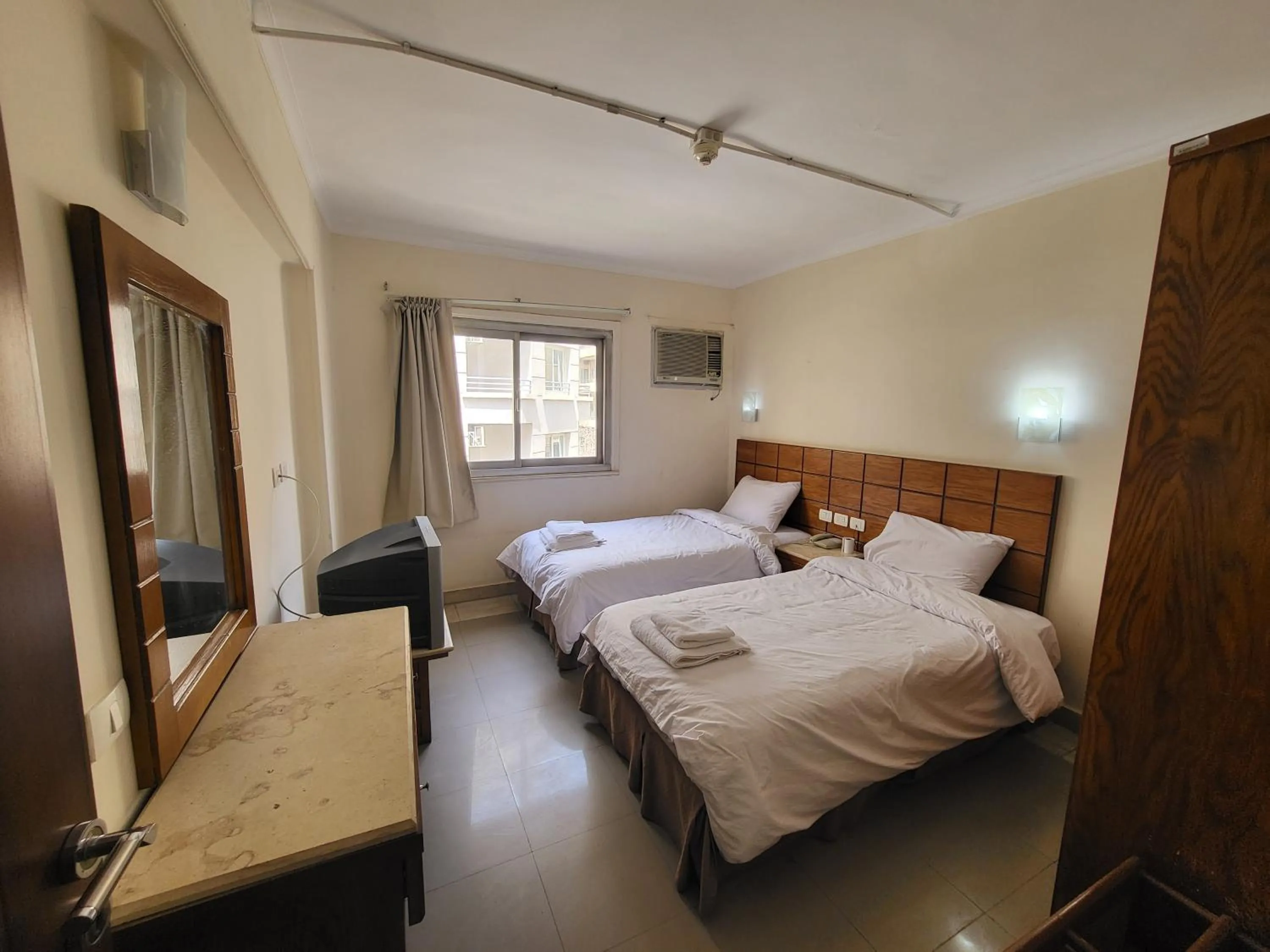 Bed in Regency Hotel