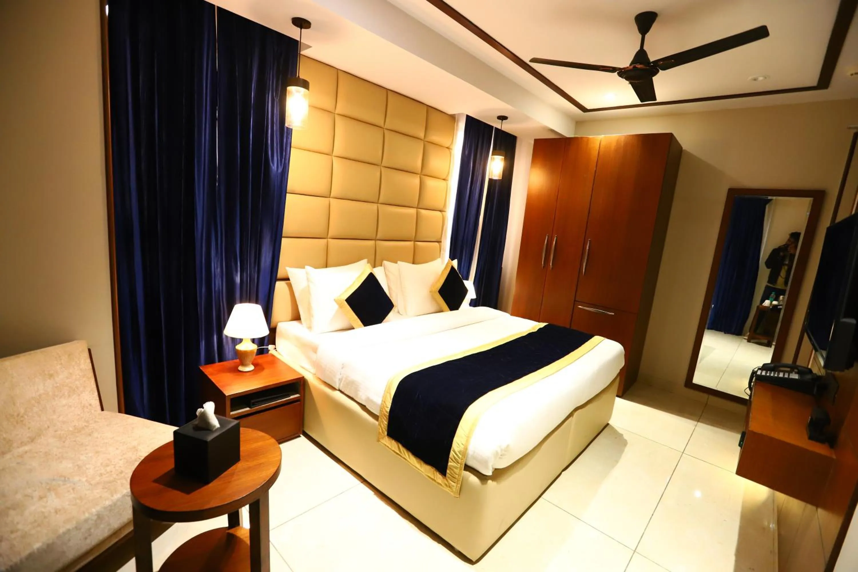 Photo of the whole room, Bed in Sanca International Hotel in Patel Nagar Delhi