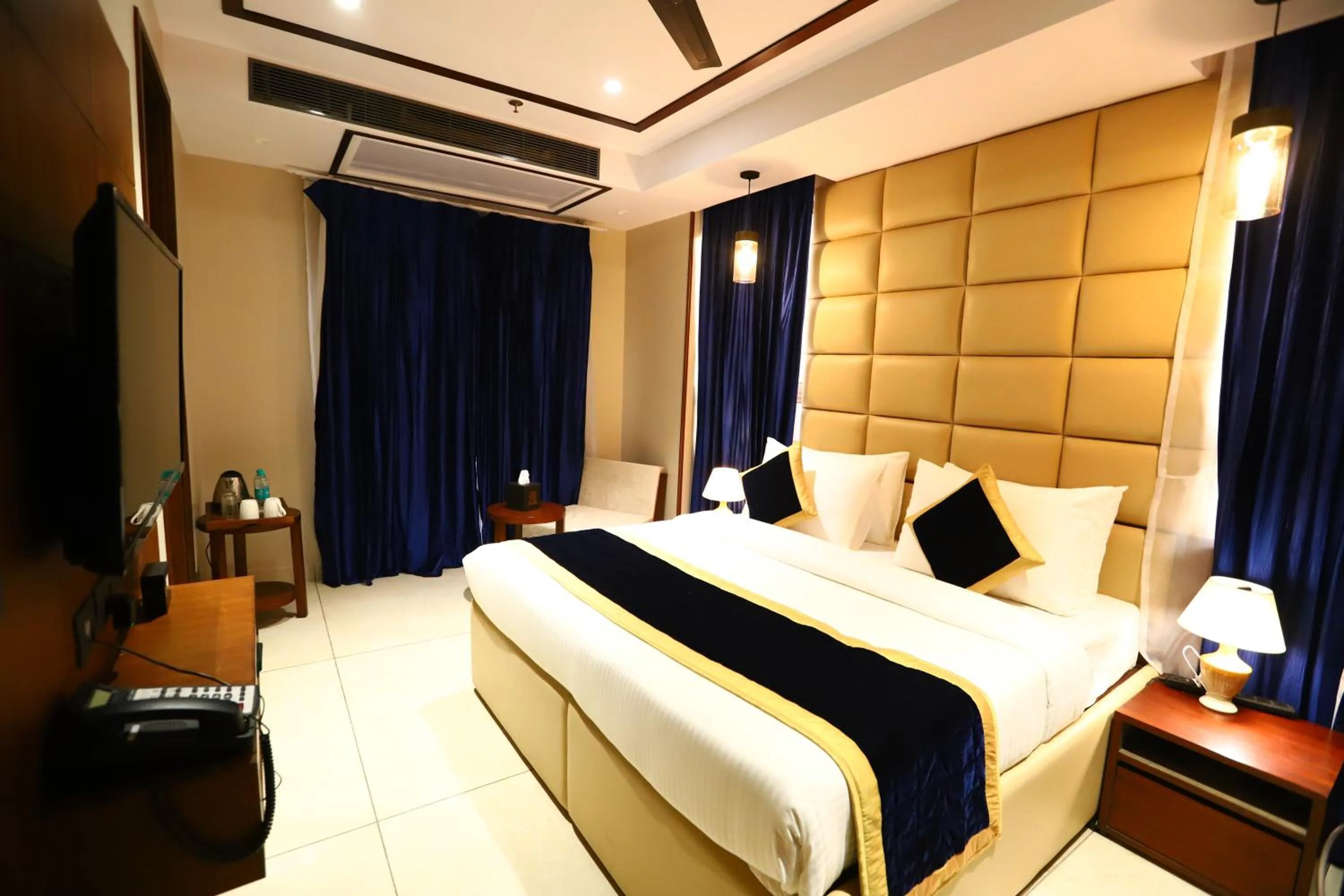 Photo of the whole room, Bed in Sanca International Hotel in Patel Nagar Delhi