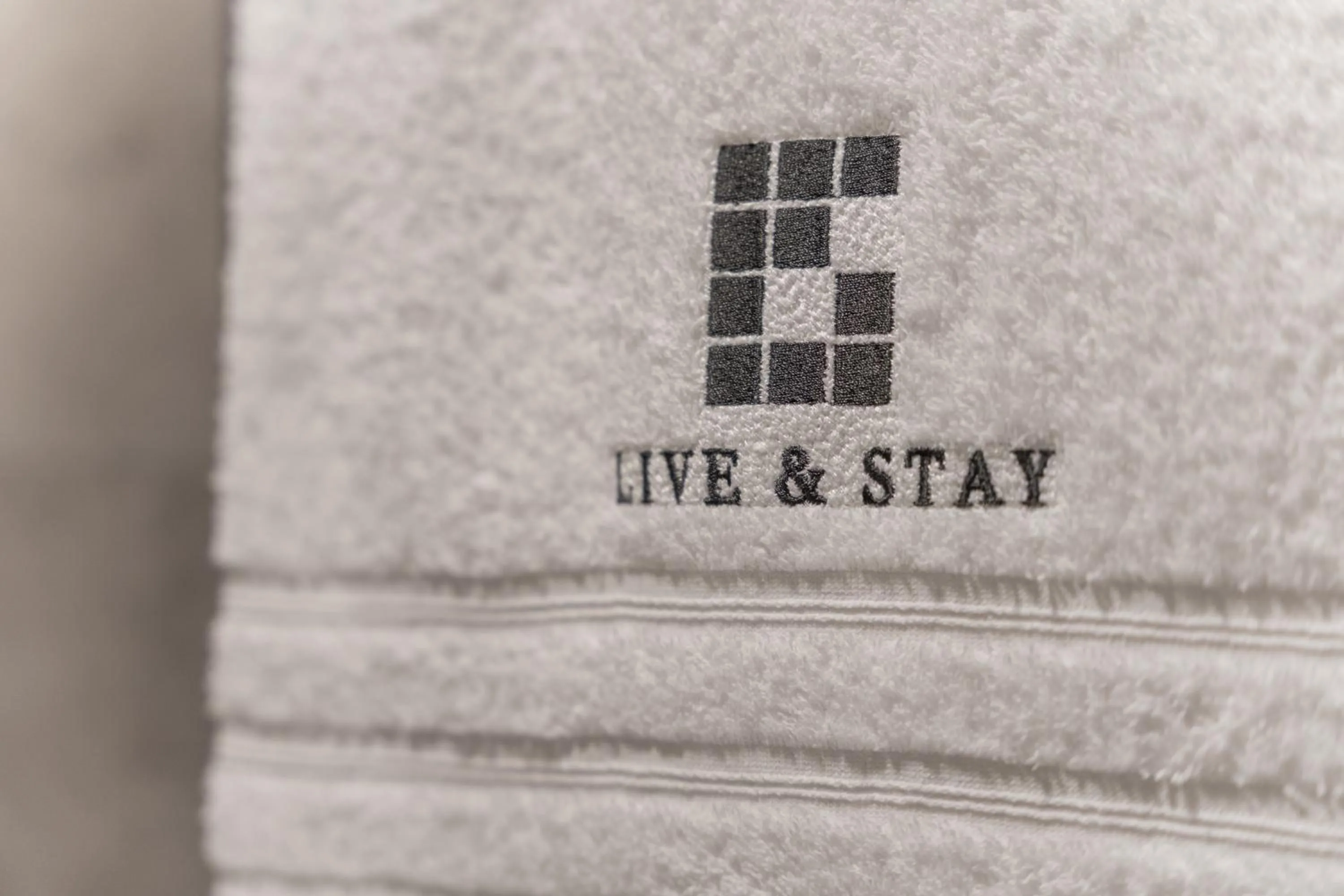 Logo/Certificate/Sign in Live and Stay Ekmanska