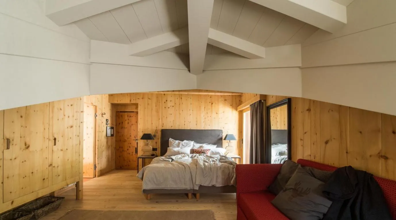 Photo of the whole room, Bed in La Genzianella Bormio