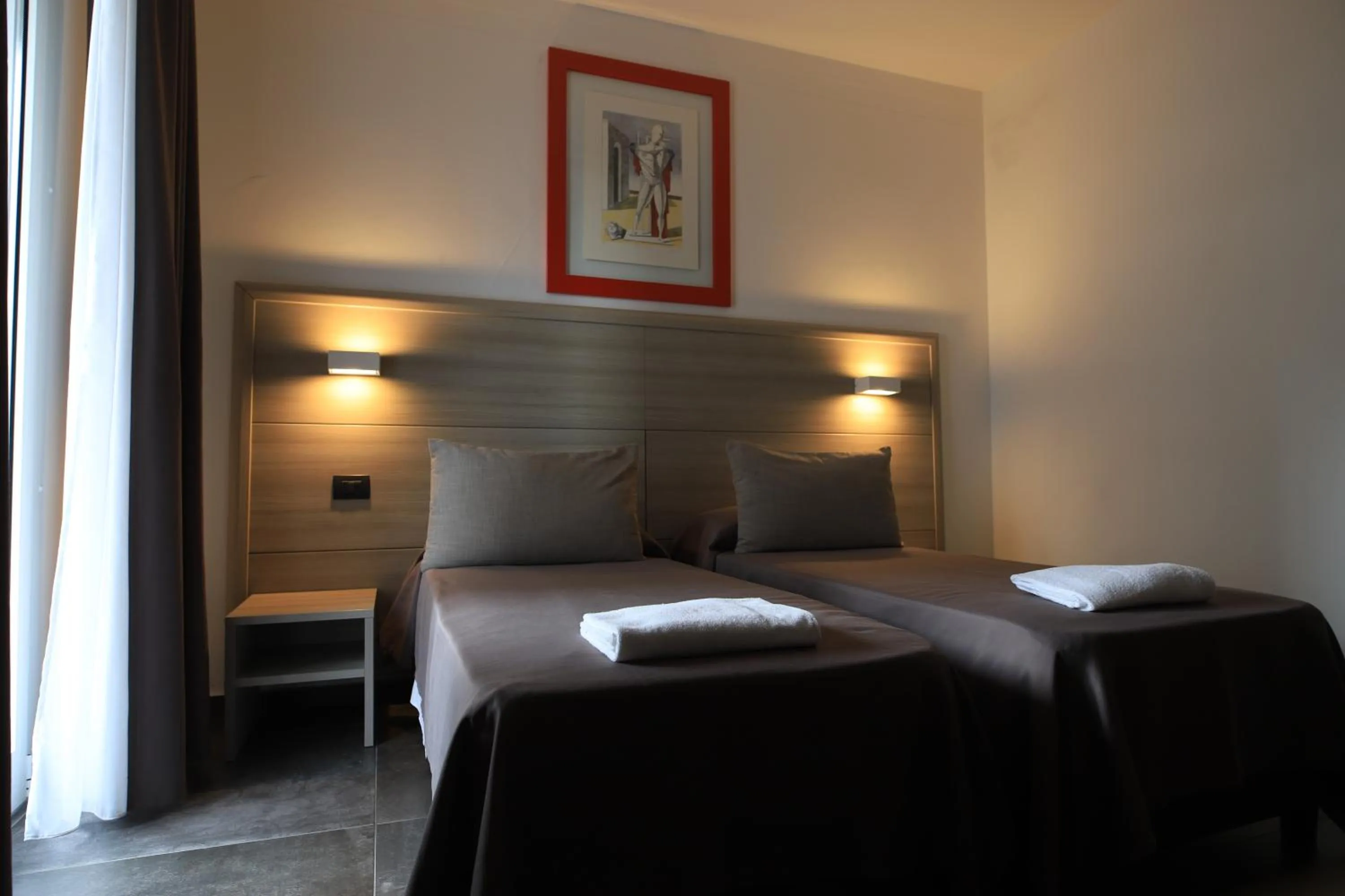 Photo of the whole room, Bed in Tiby Hotel