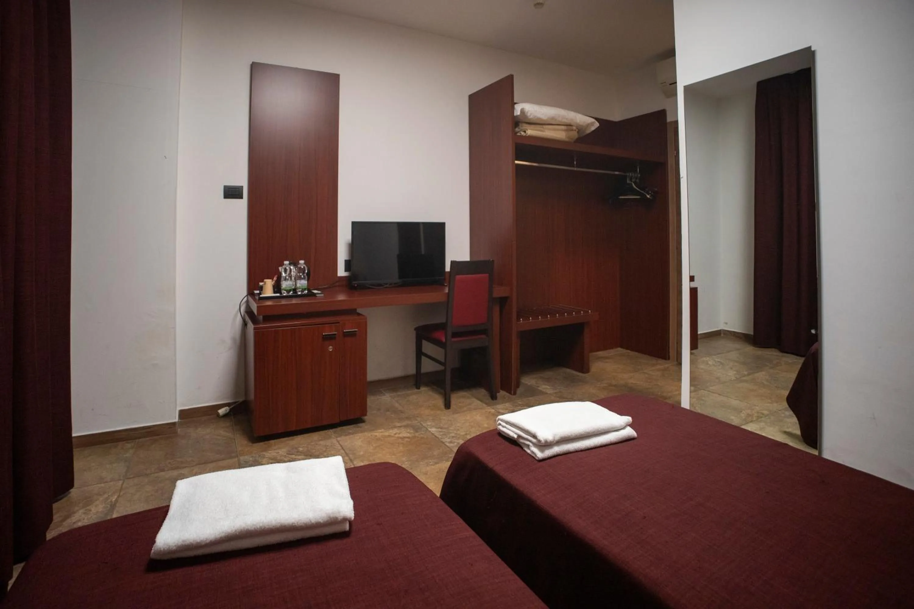 Photo of the whole room, Bed in Tiby Hotel