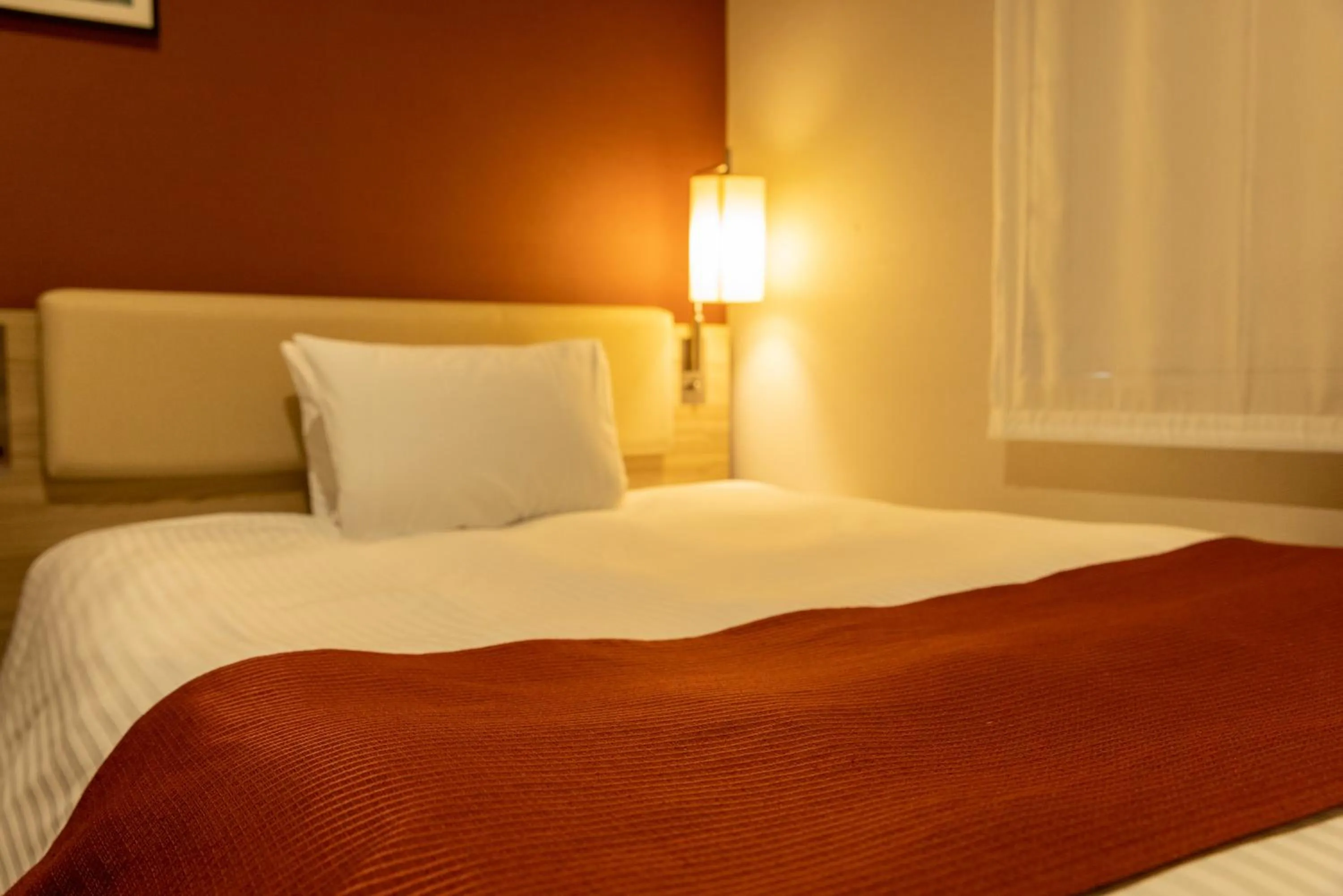 Bed in KEIKYU EX INN Keikyu Kawasaki-Station