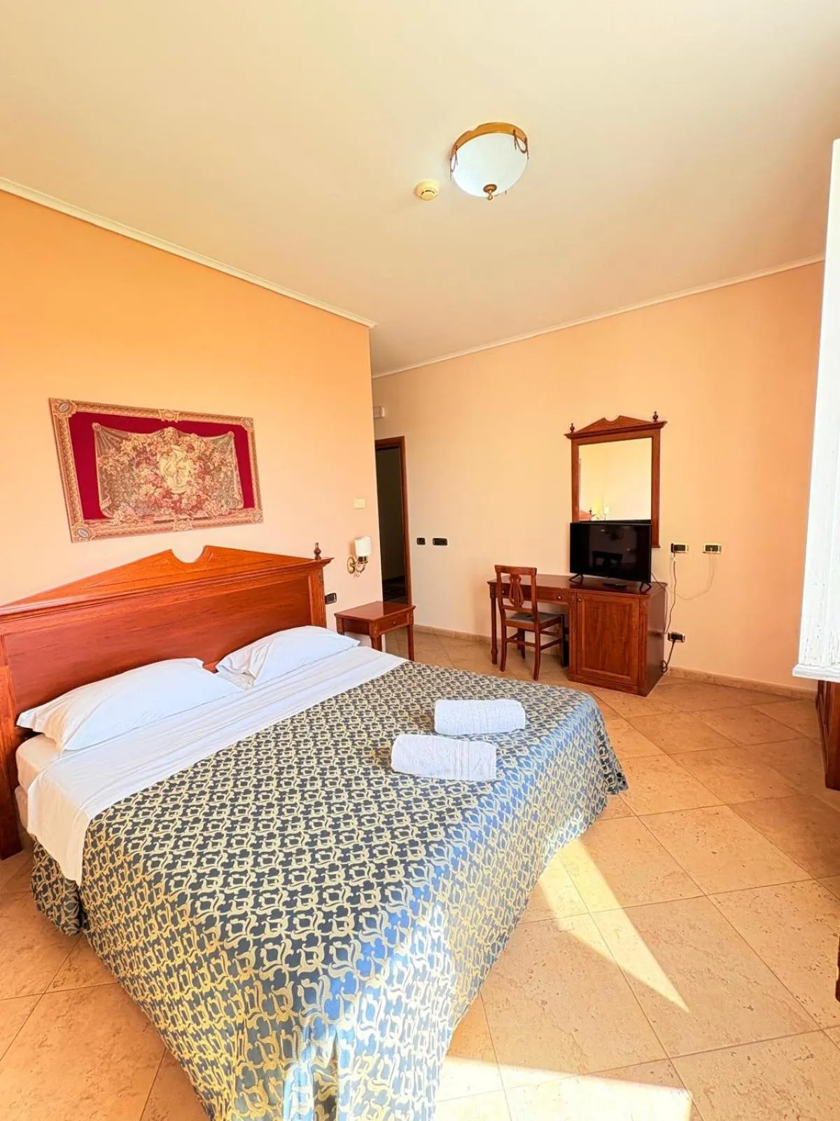 Bed in D'Angelo Palace Hotel