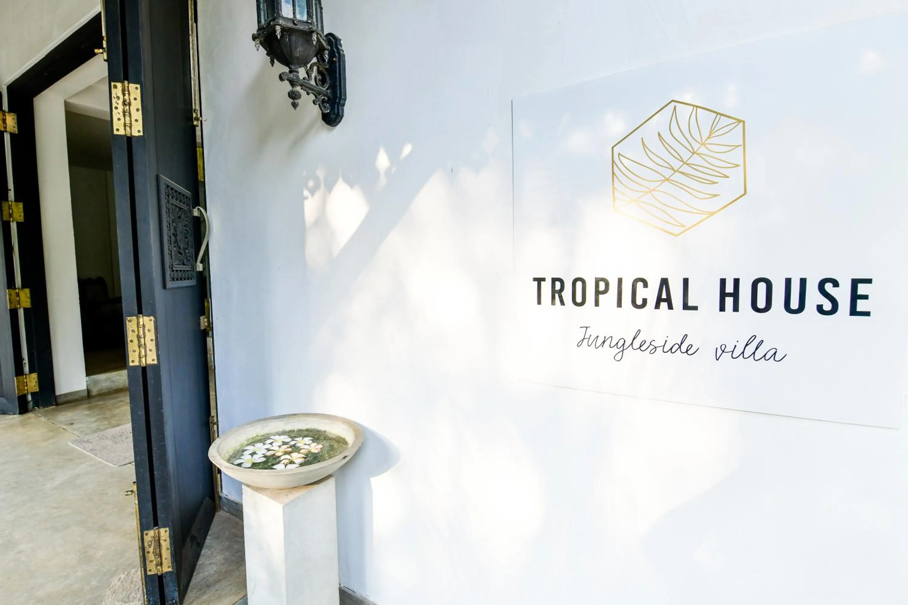 Property logo or sign in TROPICAL HOUSE - Jungleside Villa