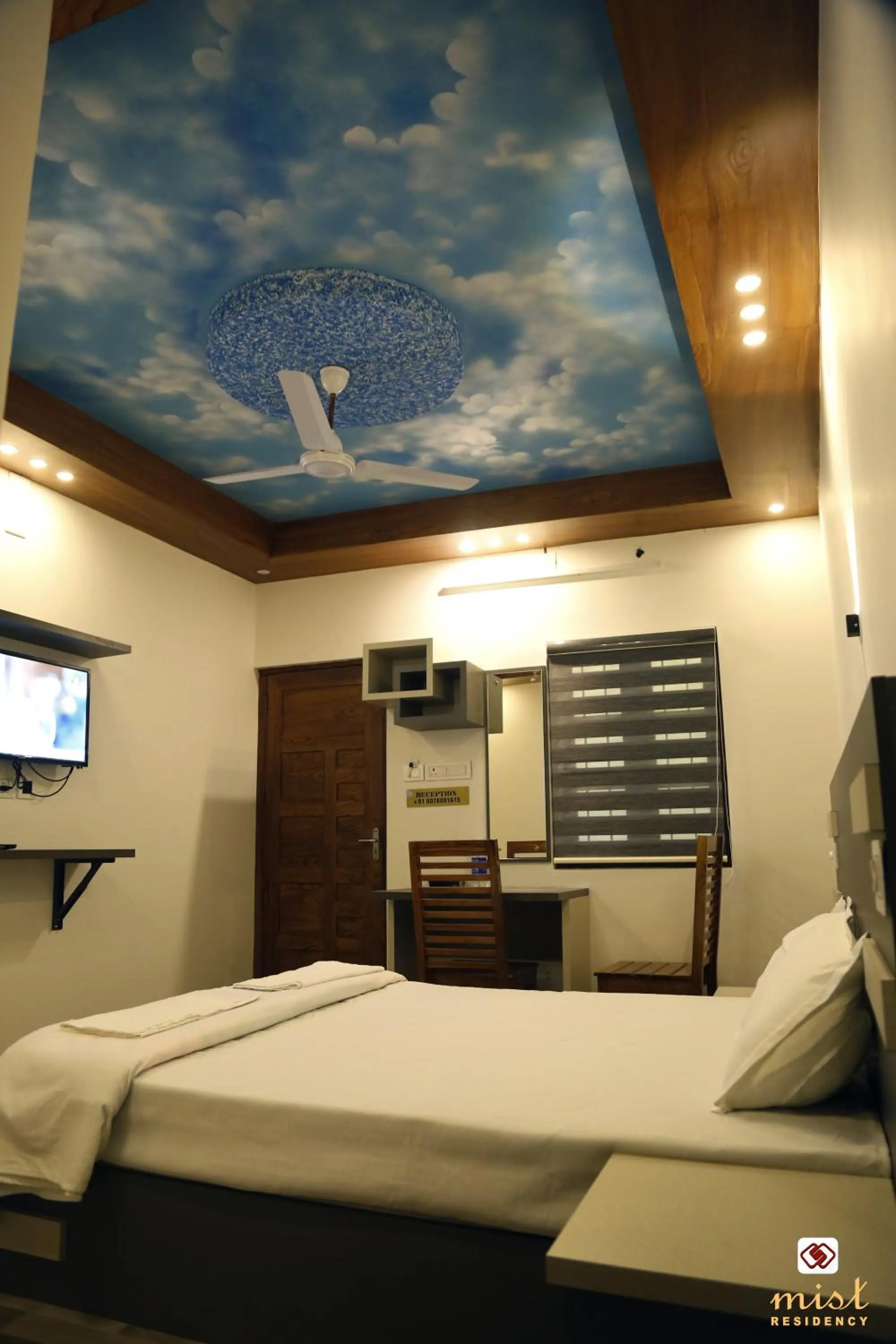 Photo of the whole room, Bed in MIST RESIDENCY