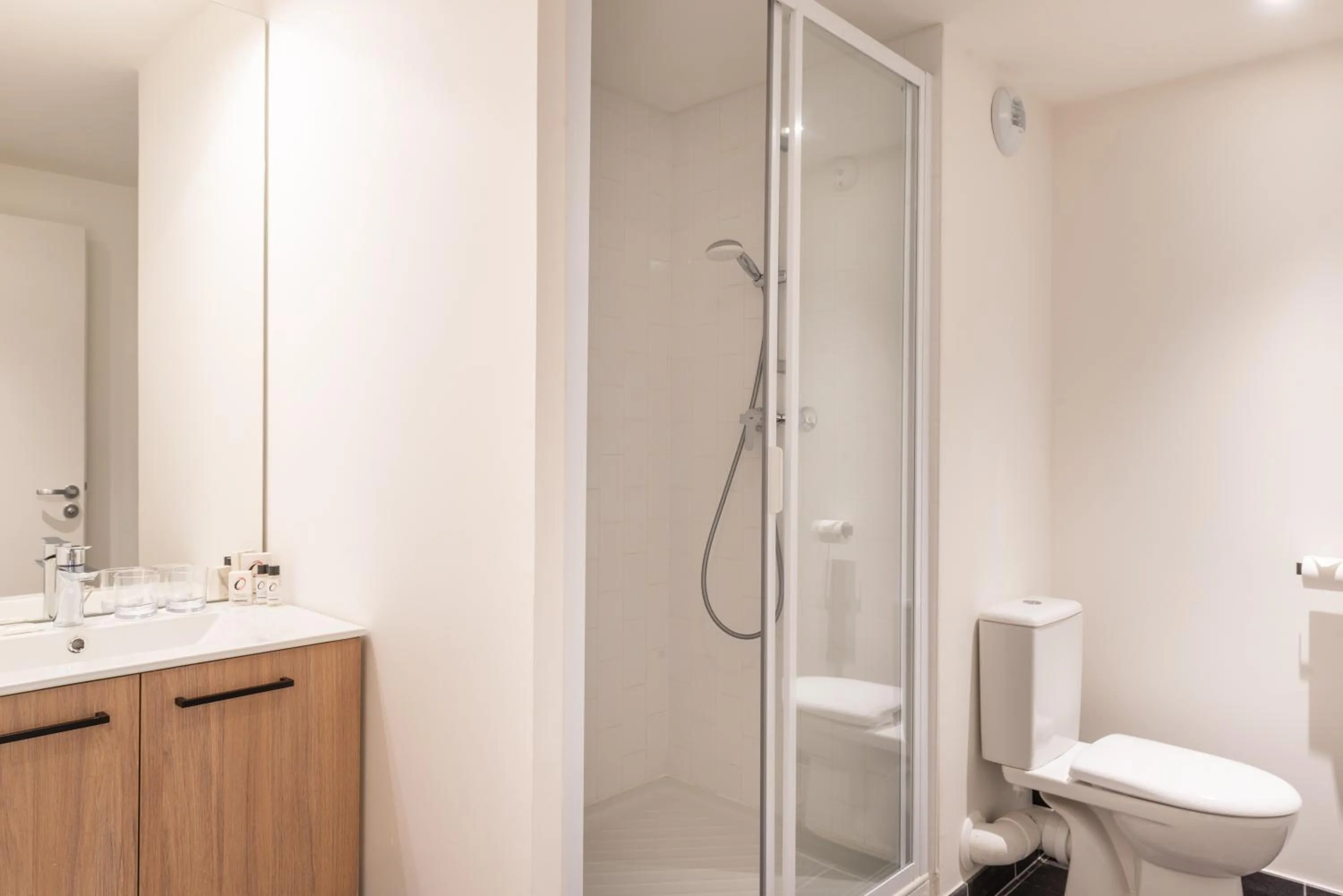 Shower in Appart Hôtel Le Monde Paris Pont d'ivry