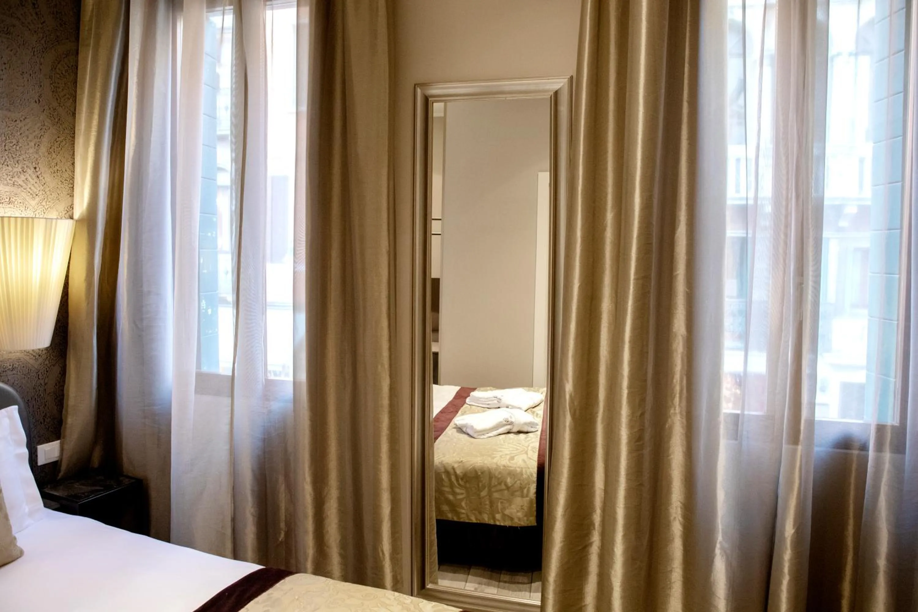 Bed in Alle Guglie Boutique Hotel