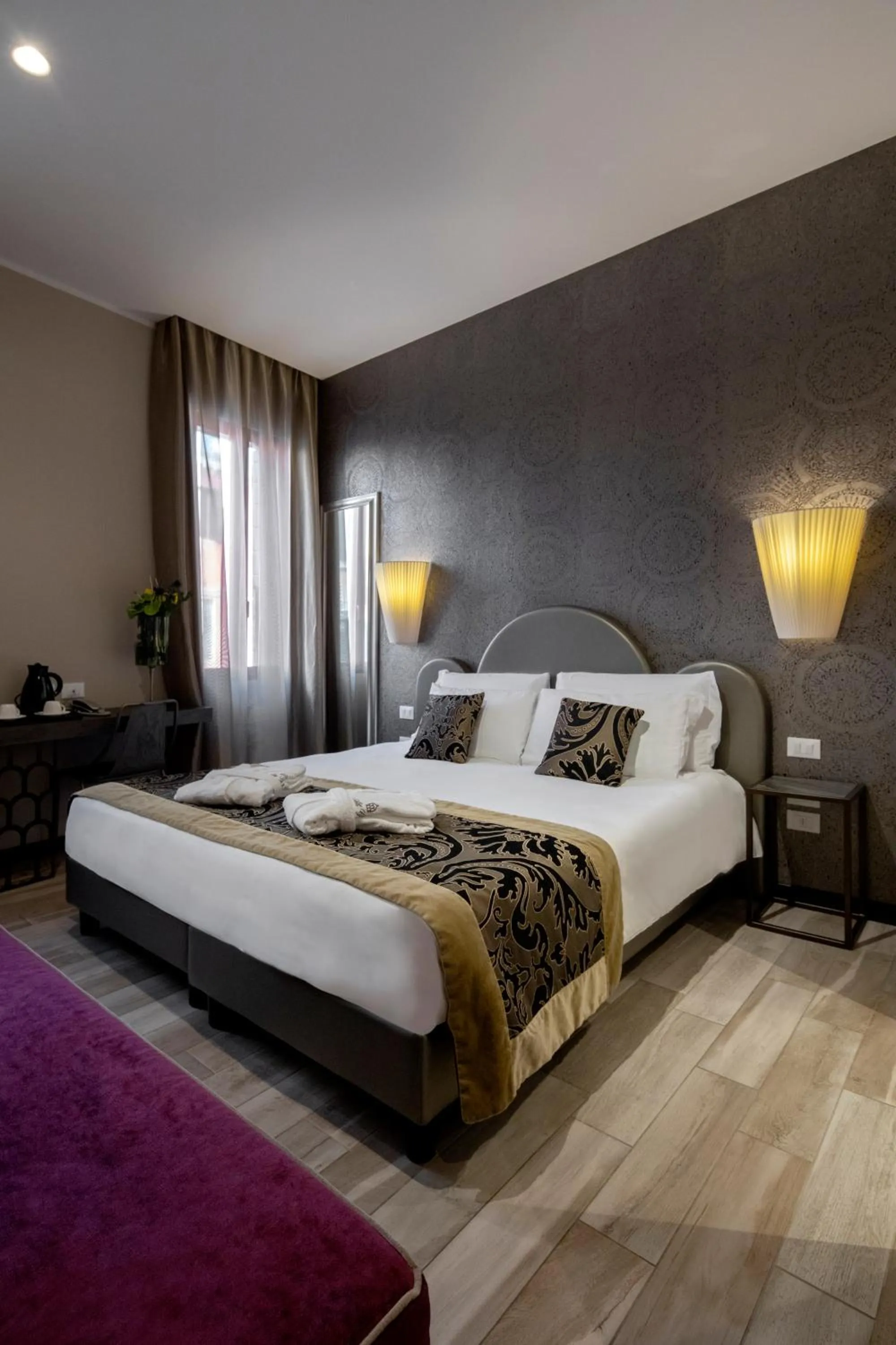 Bed in Alle Guglie Boutique Hotel