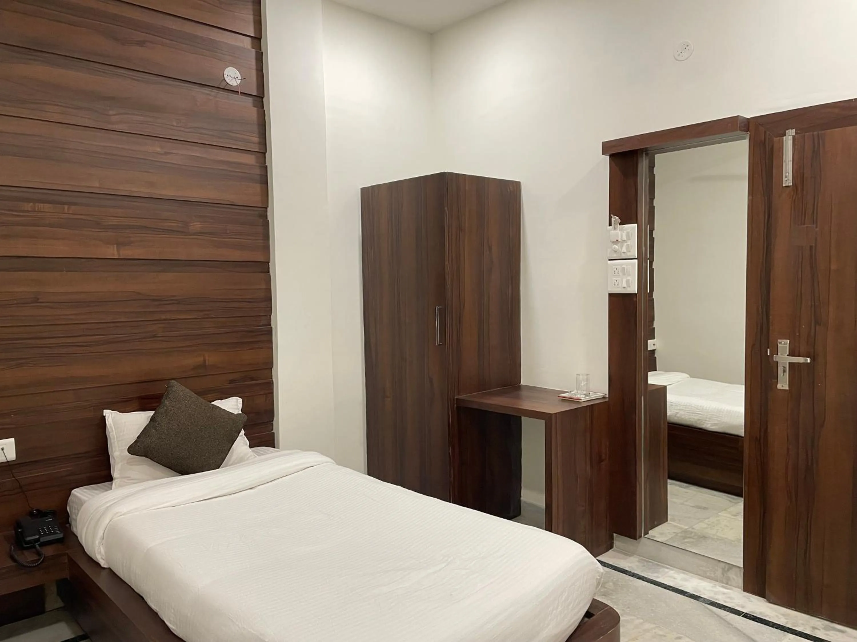 Bed in Hotel Royal Embassy