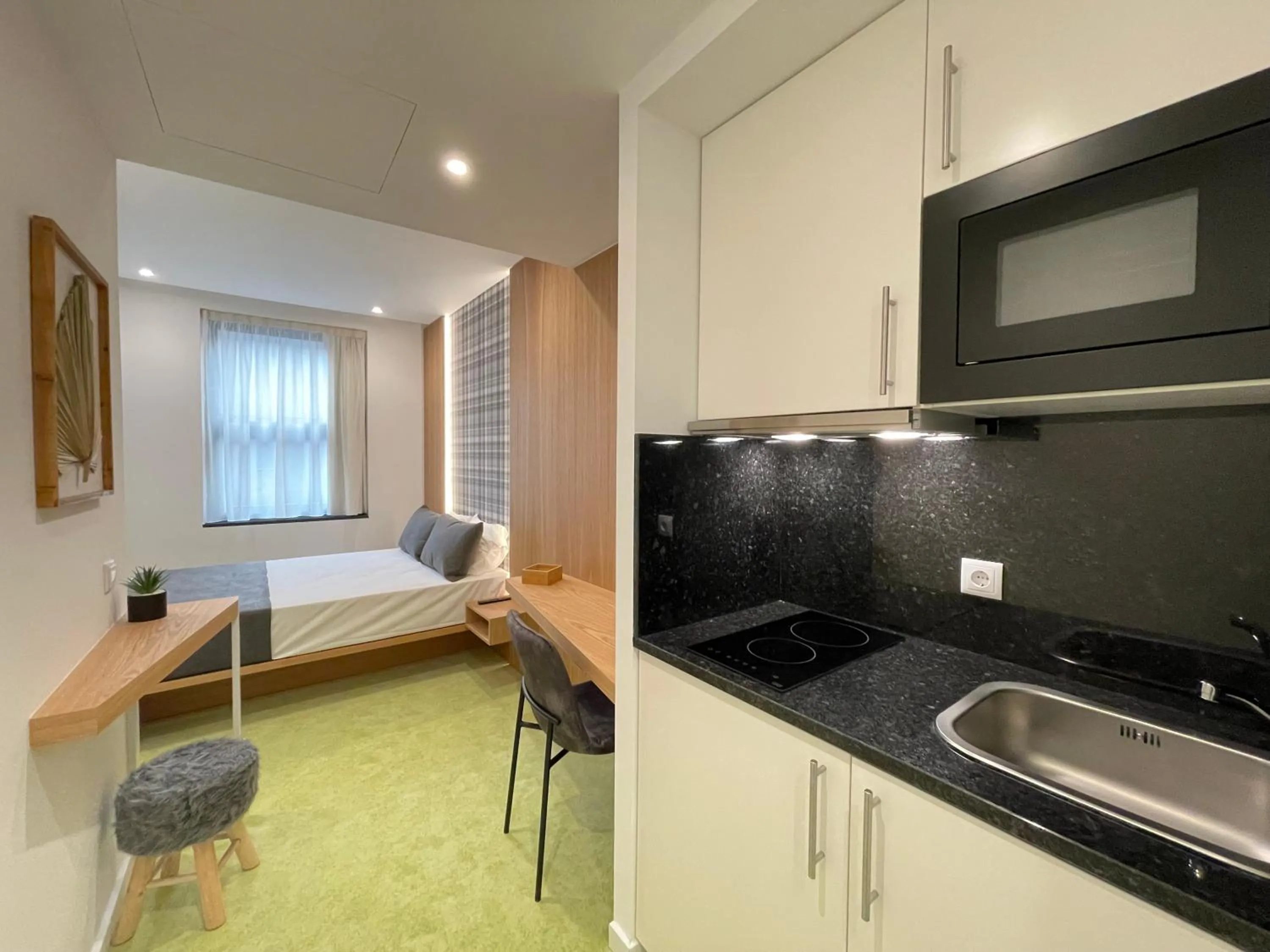 Kitchen or kitchenette in MyStay Porto São Bento