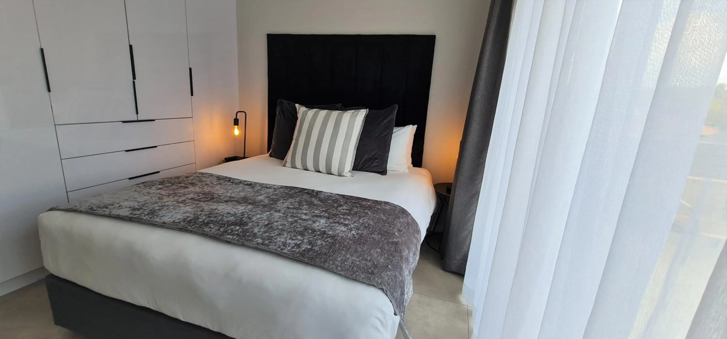 Bed in MINT Apartments Greenside